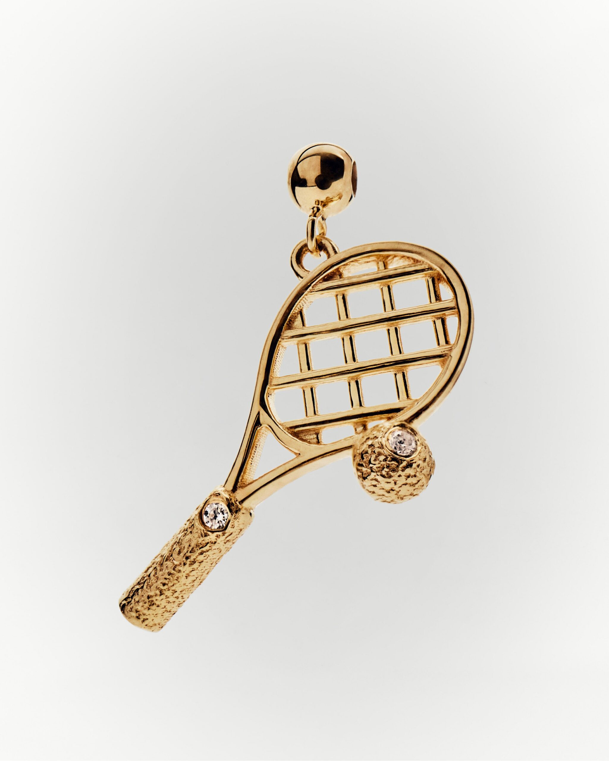 Tennis charm