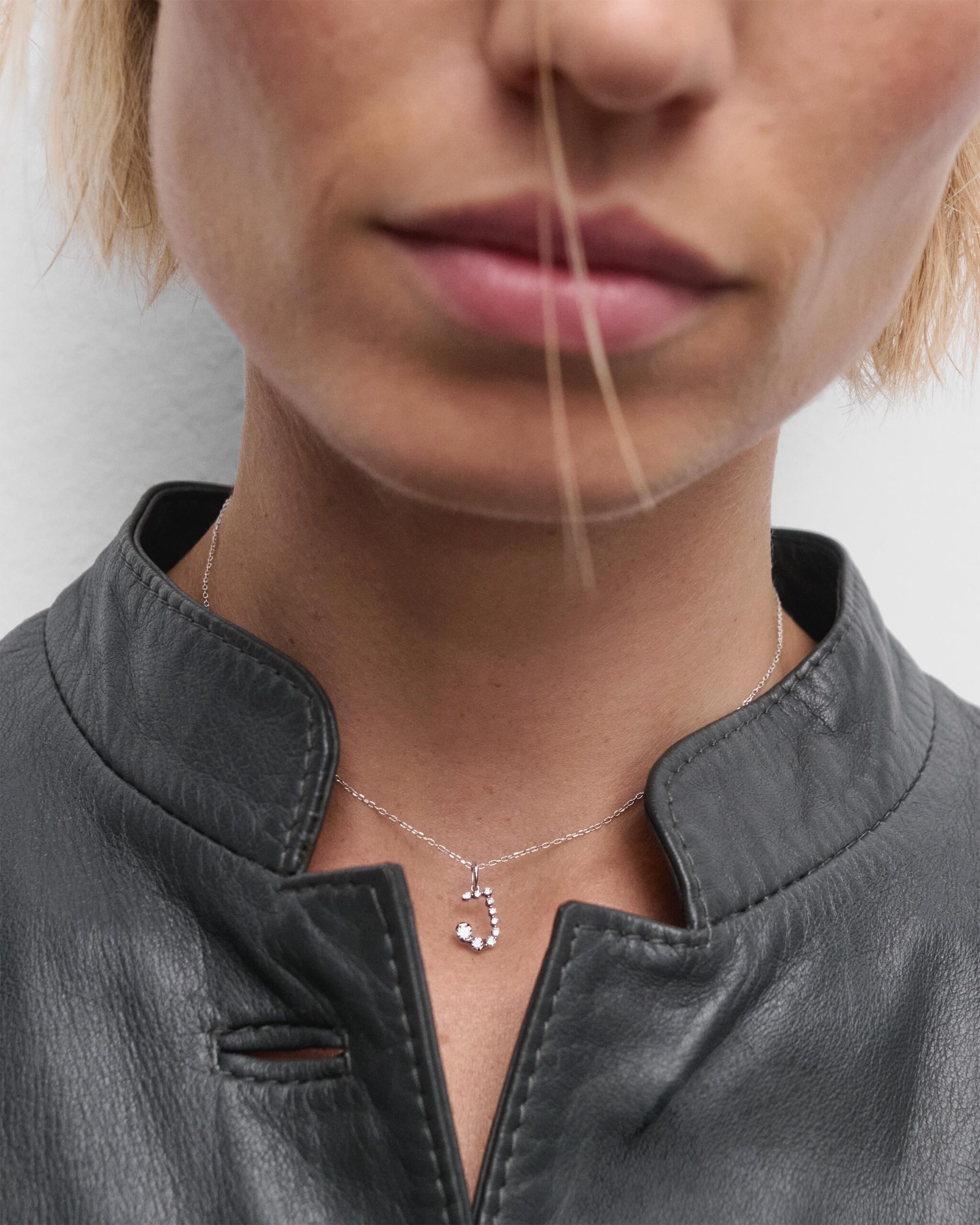 Diamonds and white gold Initial pendant