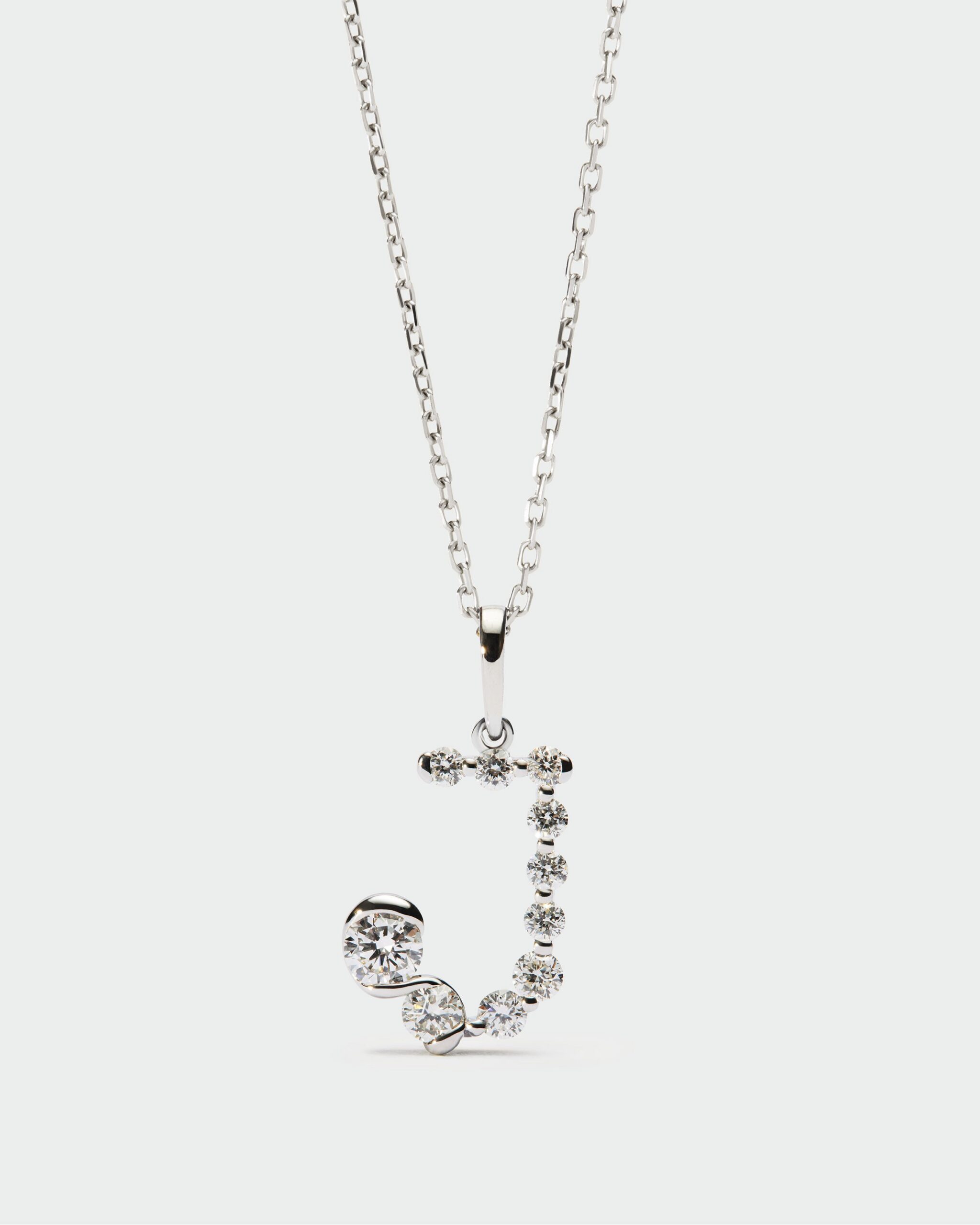 Diamonds and white gold Initial pendant