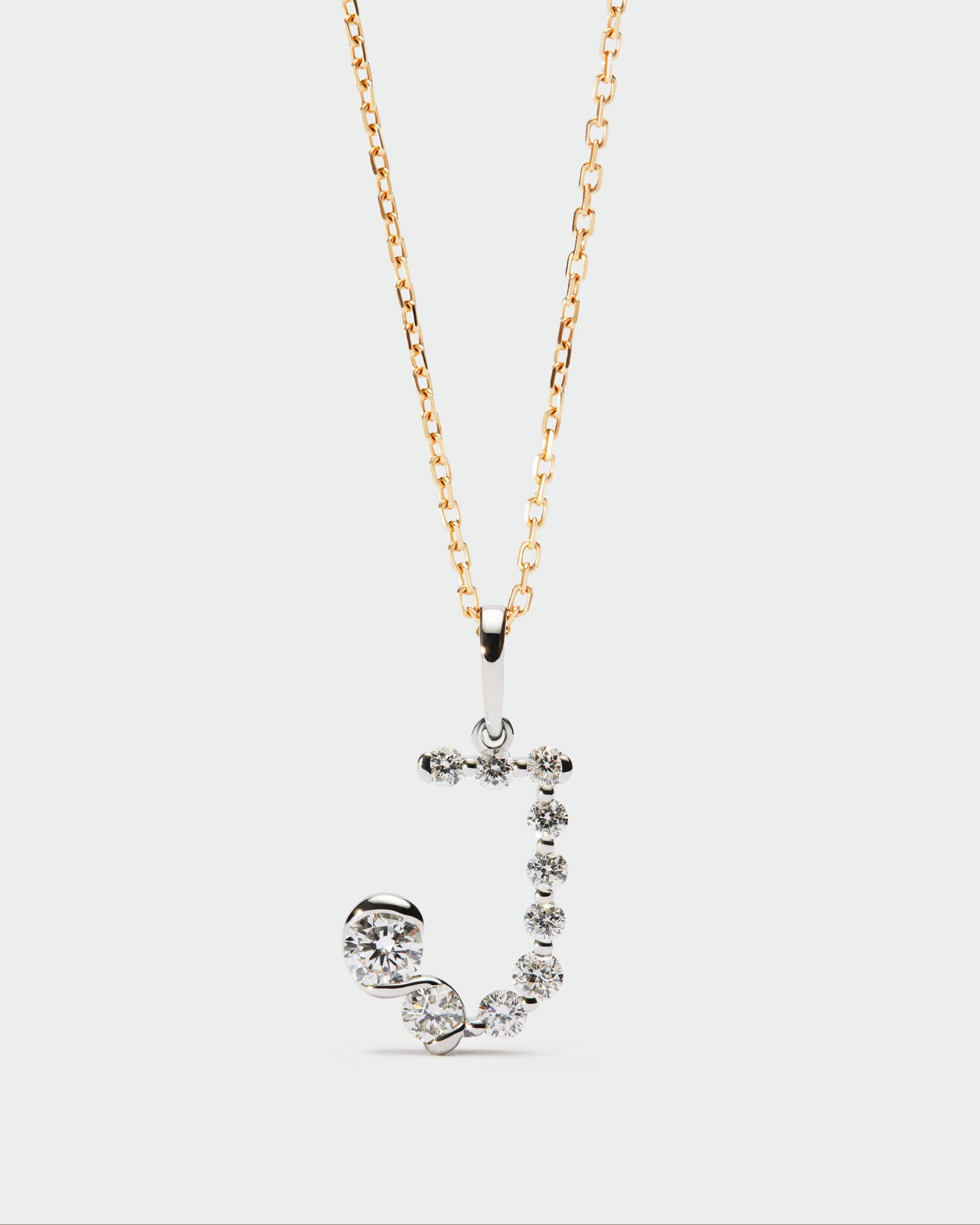 Diamonds and white gold Initial pendant