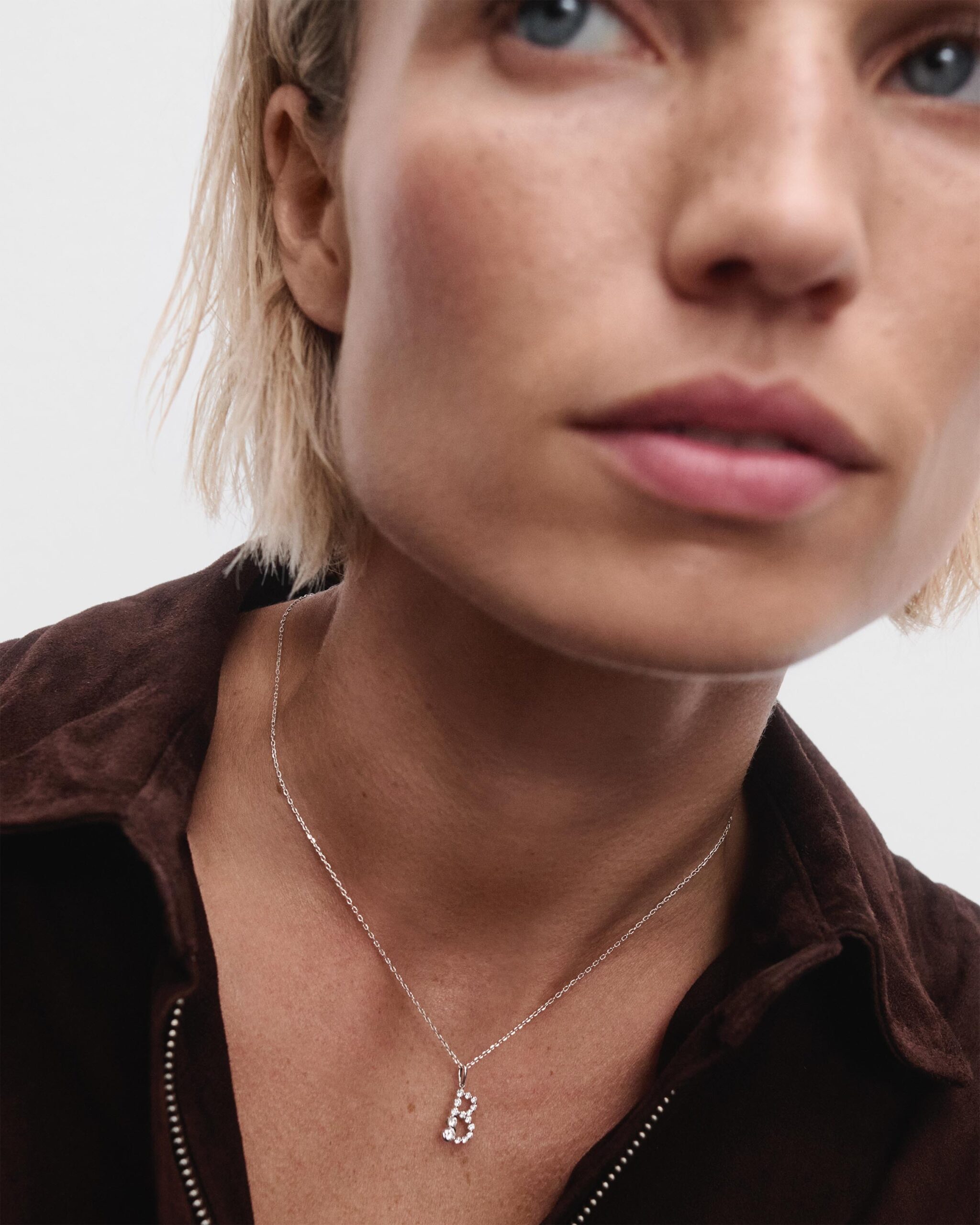 Diamonds and white gold Initial pendant