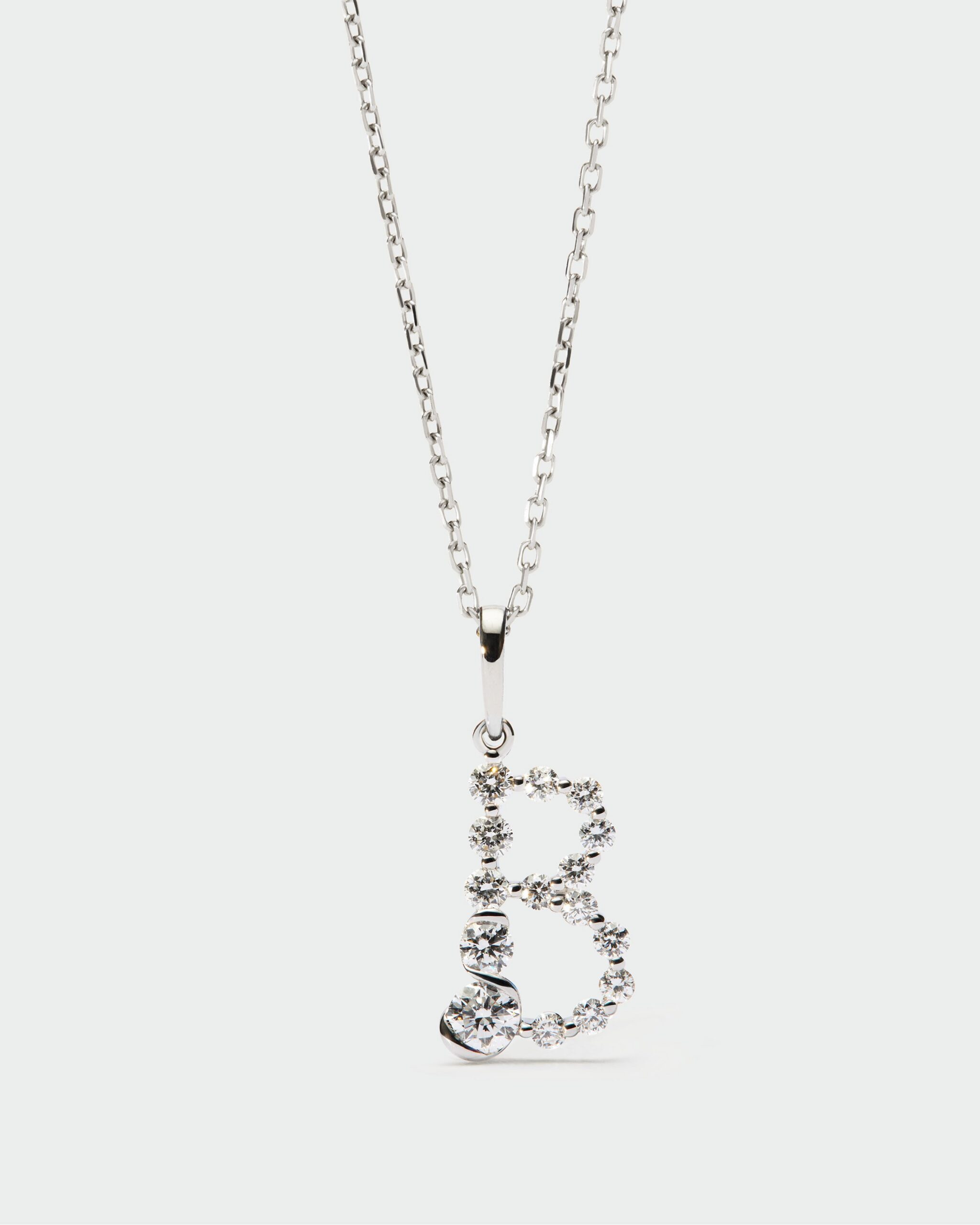 Diamonds and white gold Initial pendant