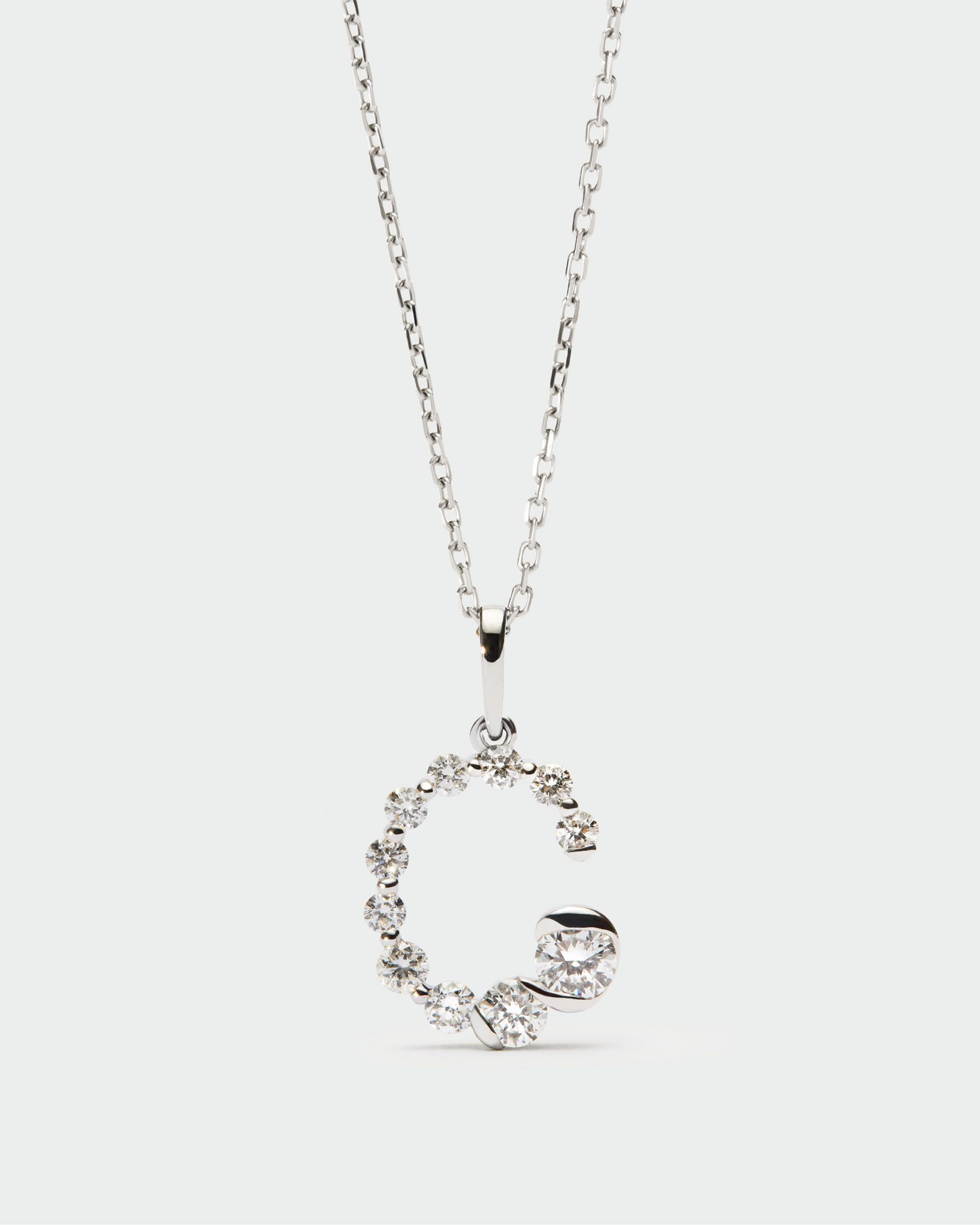 Diamonds and white gold Initial pendant