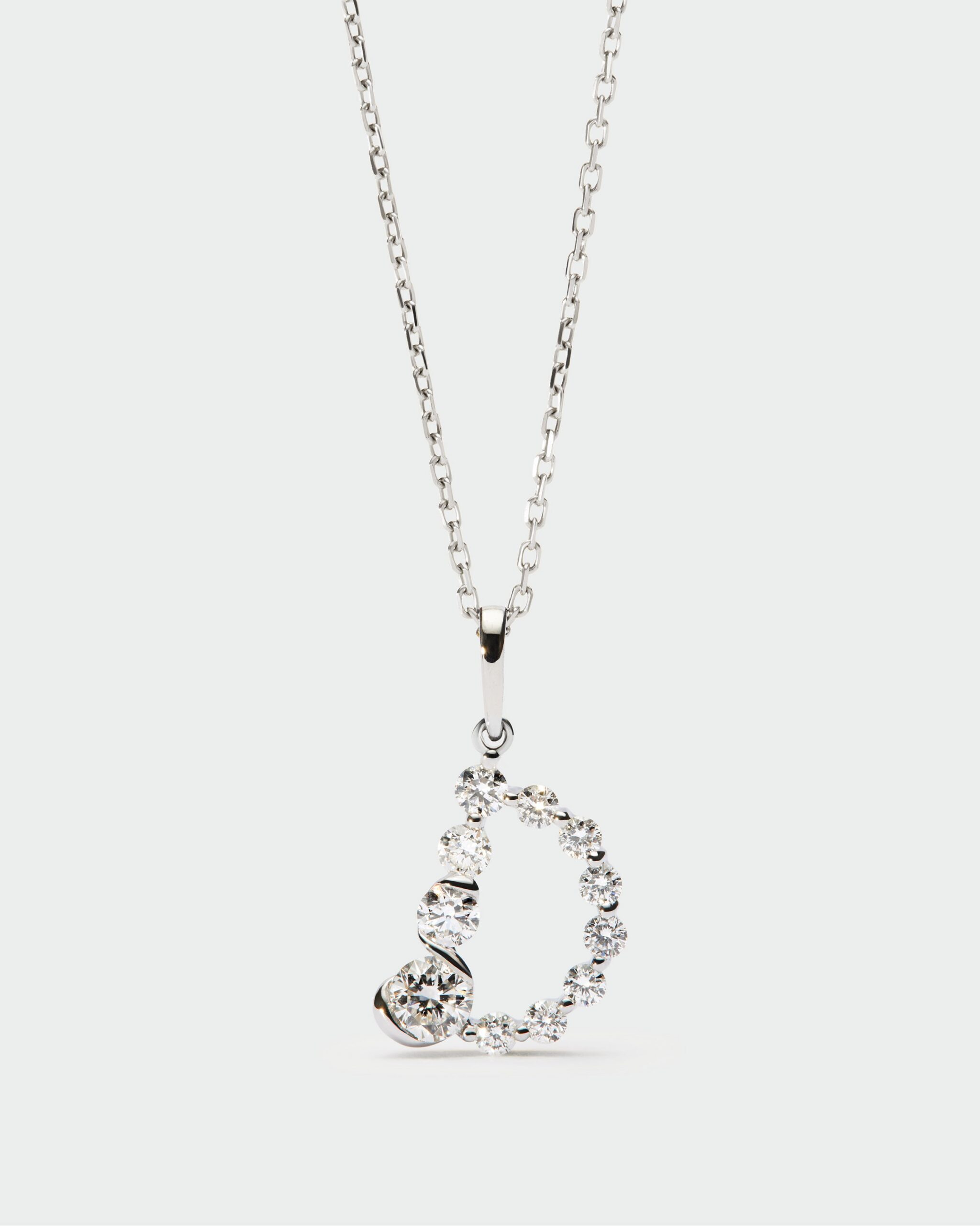 Diamonds and white gold Initial pendant