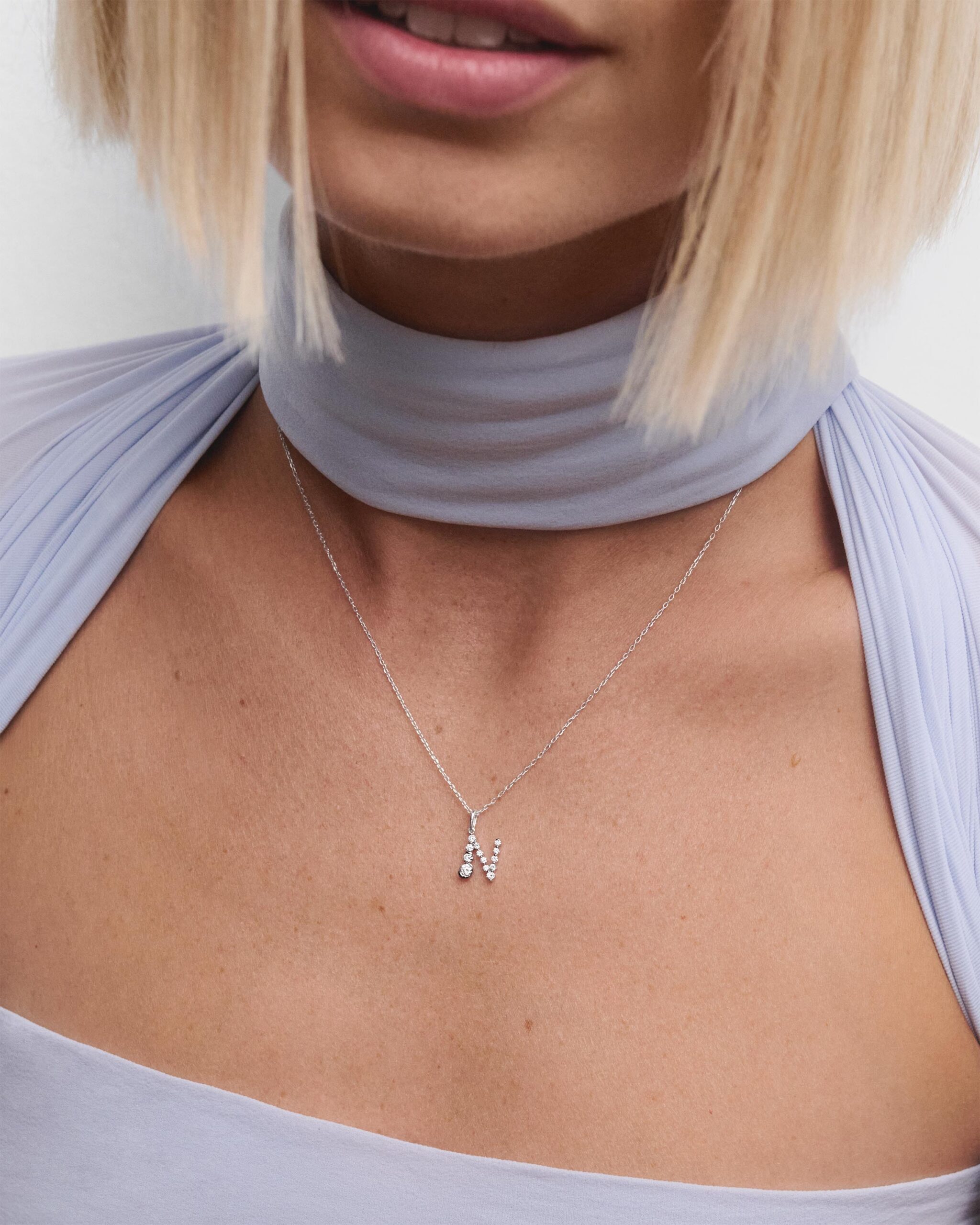 Diamonds and white gold Initial pendant