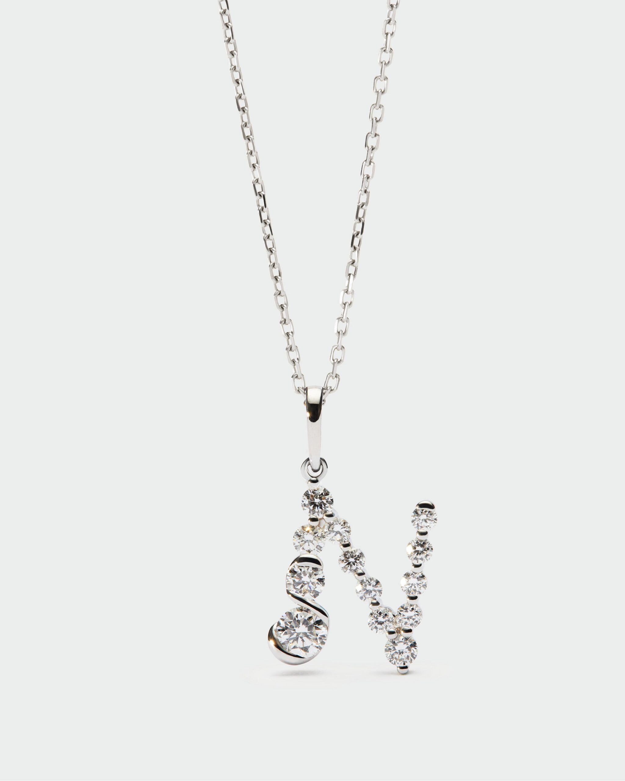 Diamonds and white gold Initial pendant