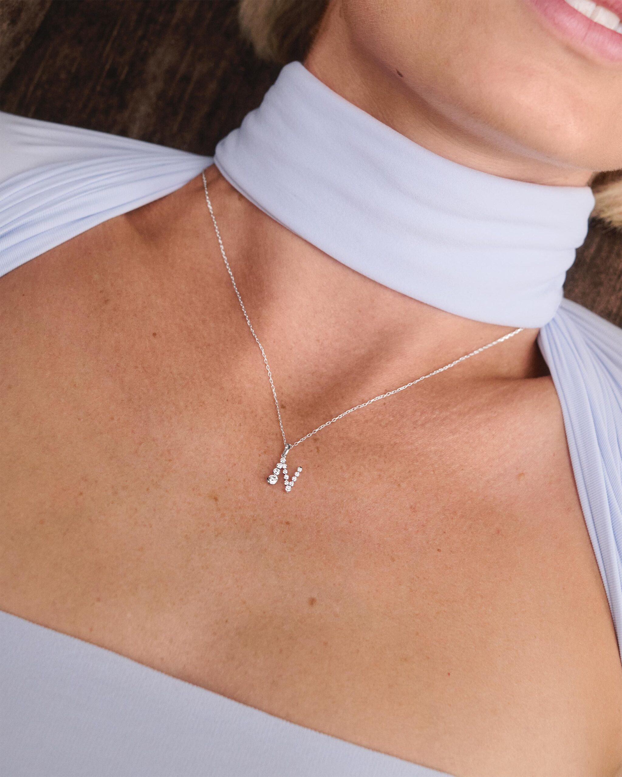 Diamonds and white gold Initial pendant