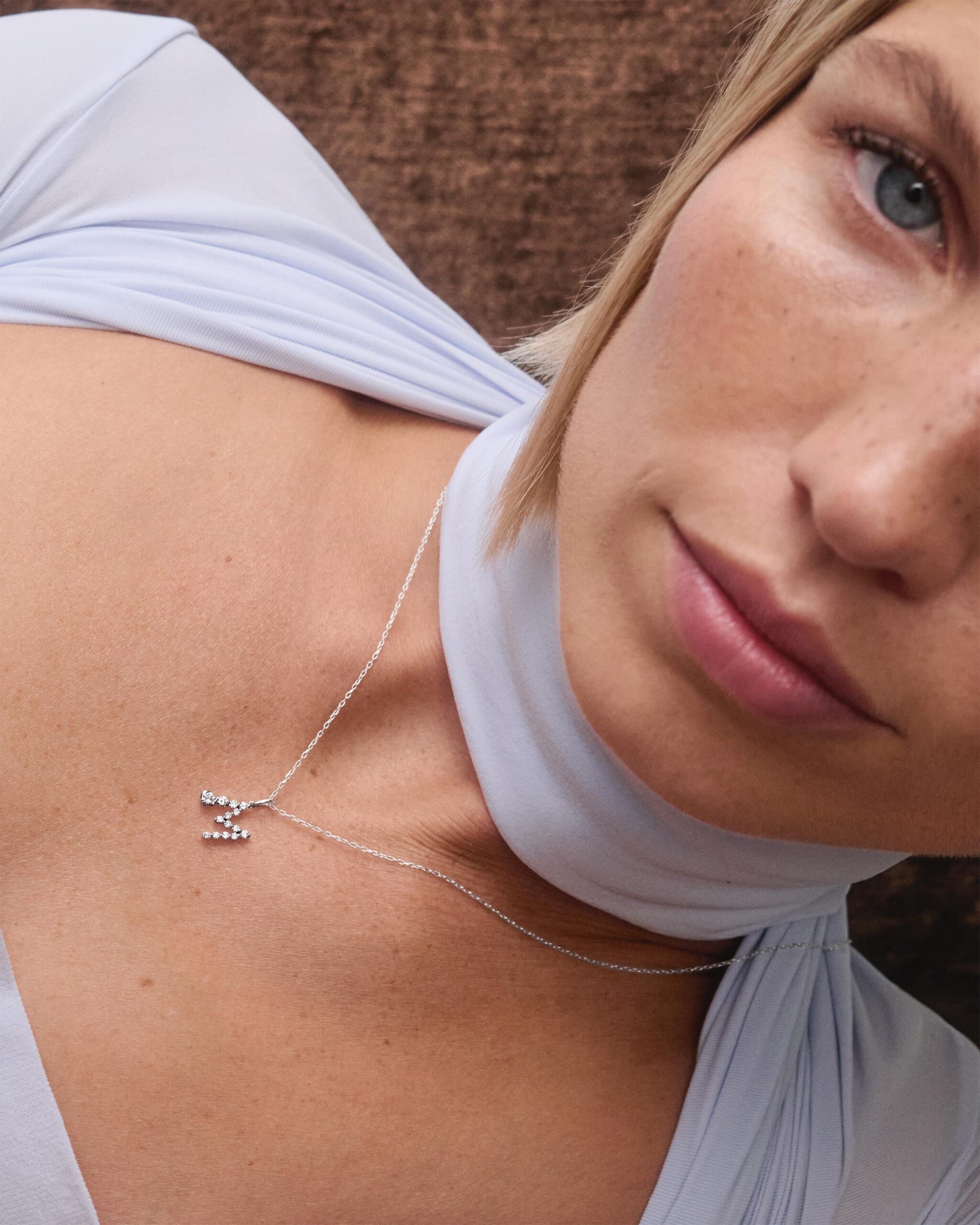 Diamonds and white gold Initial pendant