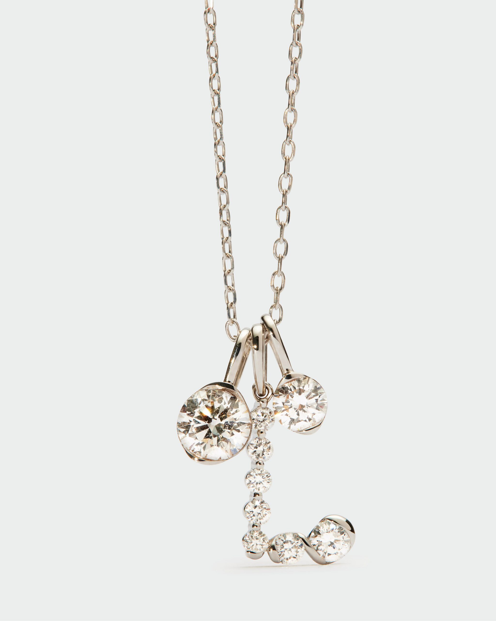 Diamonds and white gold Initial pendant