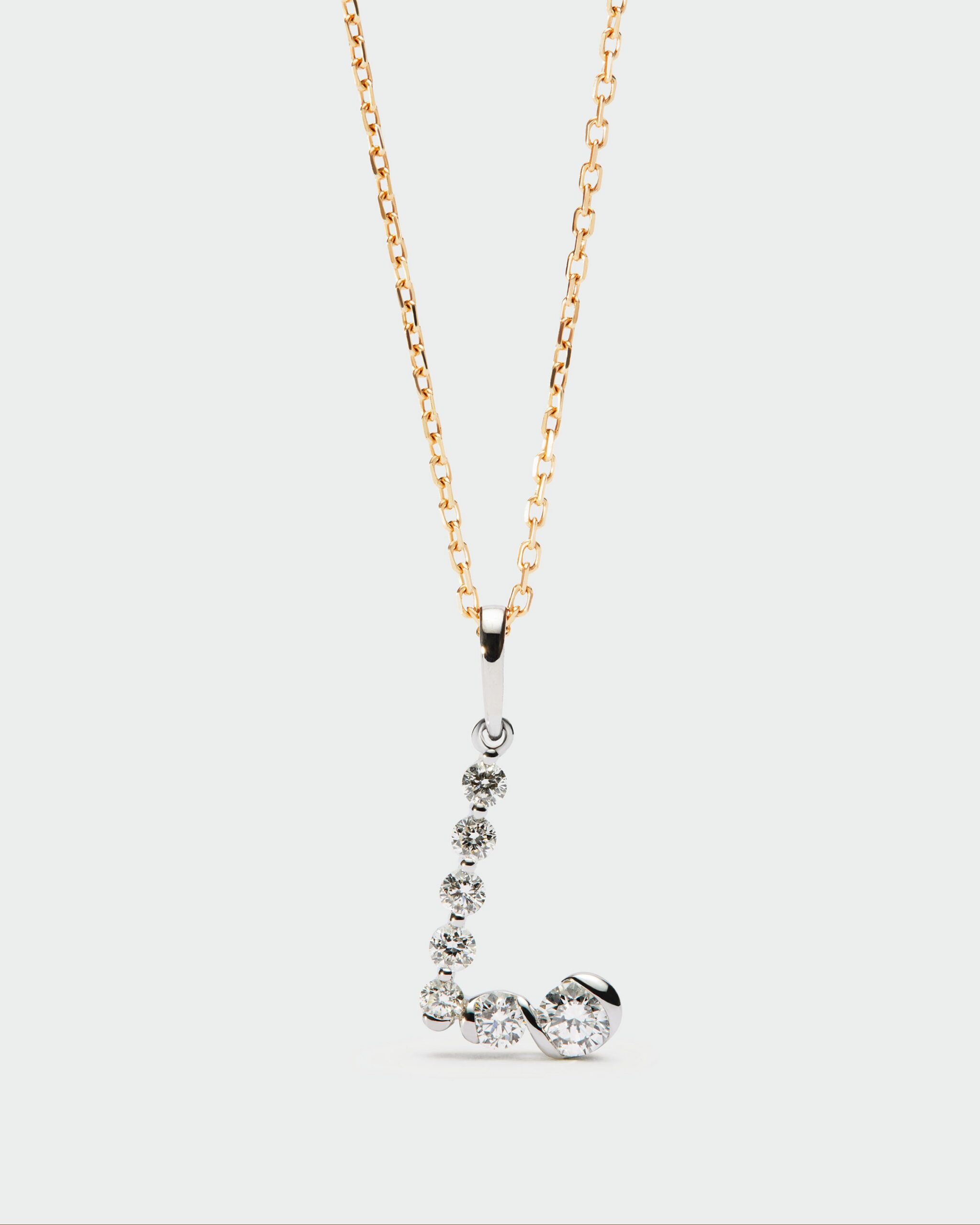 Diamonds and white gold Initial pendant