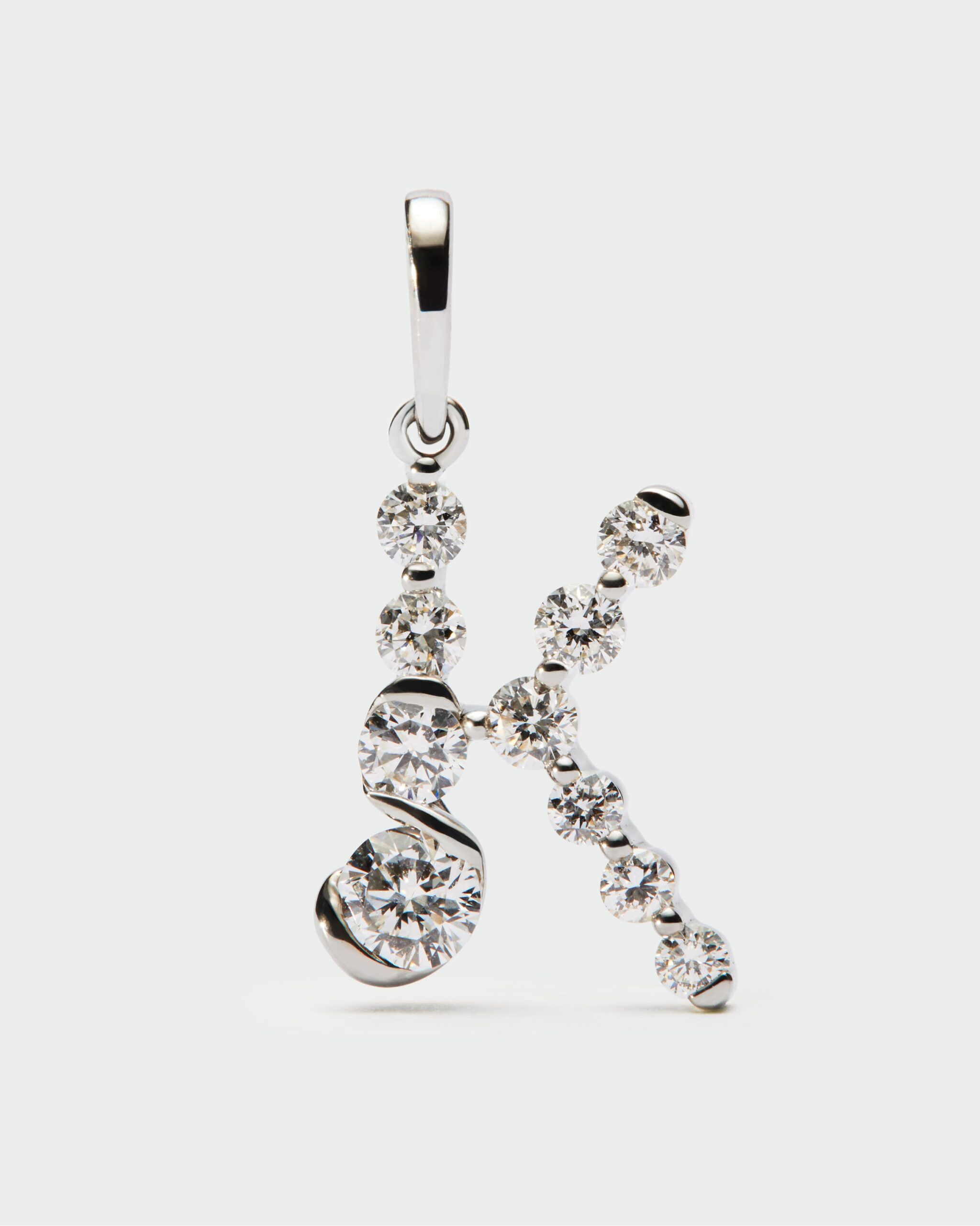 Diamonds and white gold Initial pendant