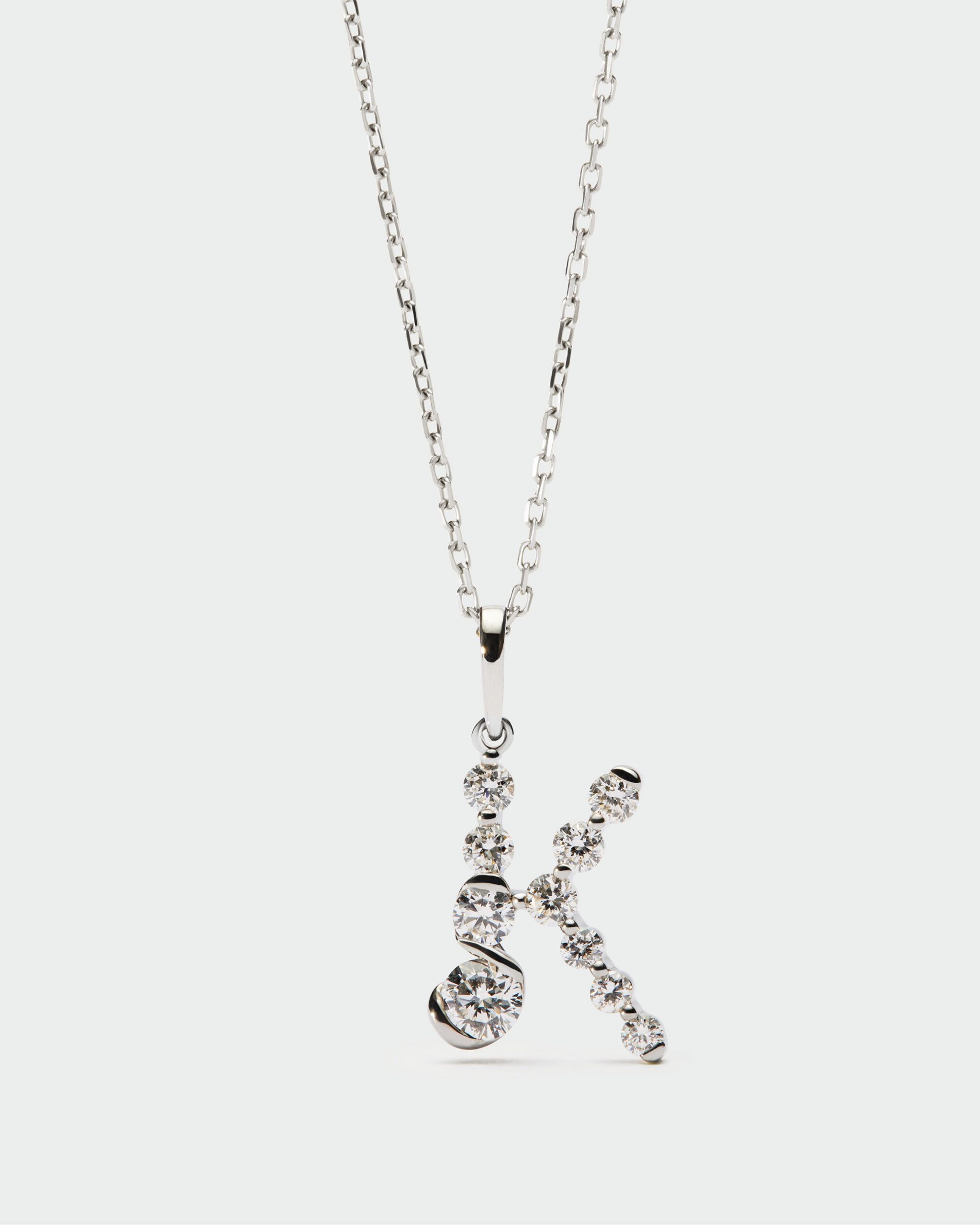Diamonds and white gold Initial pendant