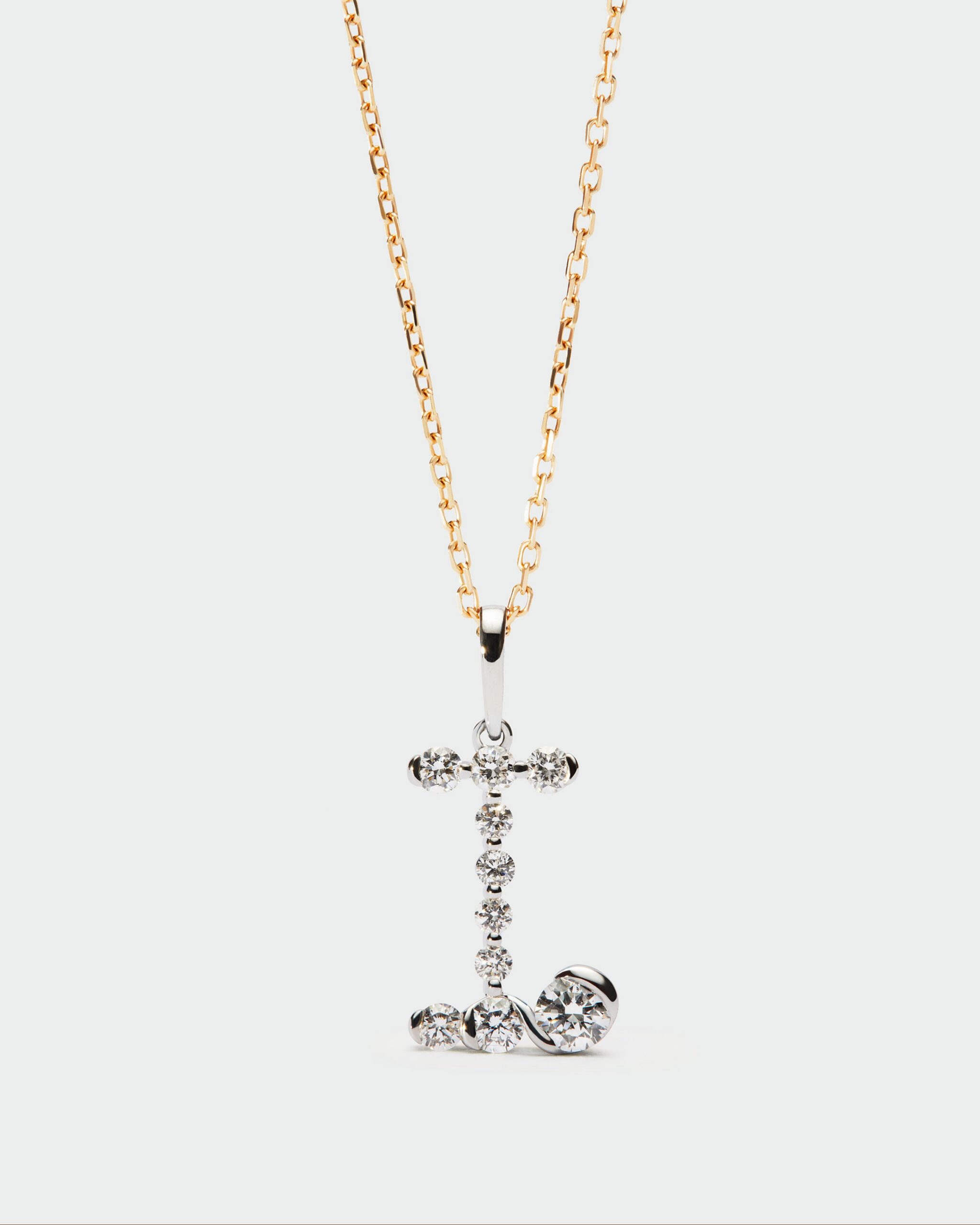 Diamonds and white gold Initial pendant