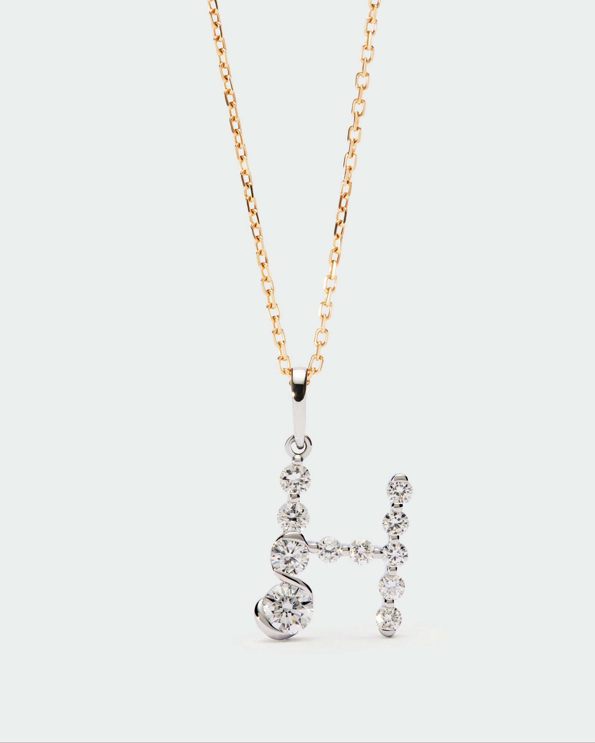 Diamonds and white gold Initial pendant
