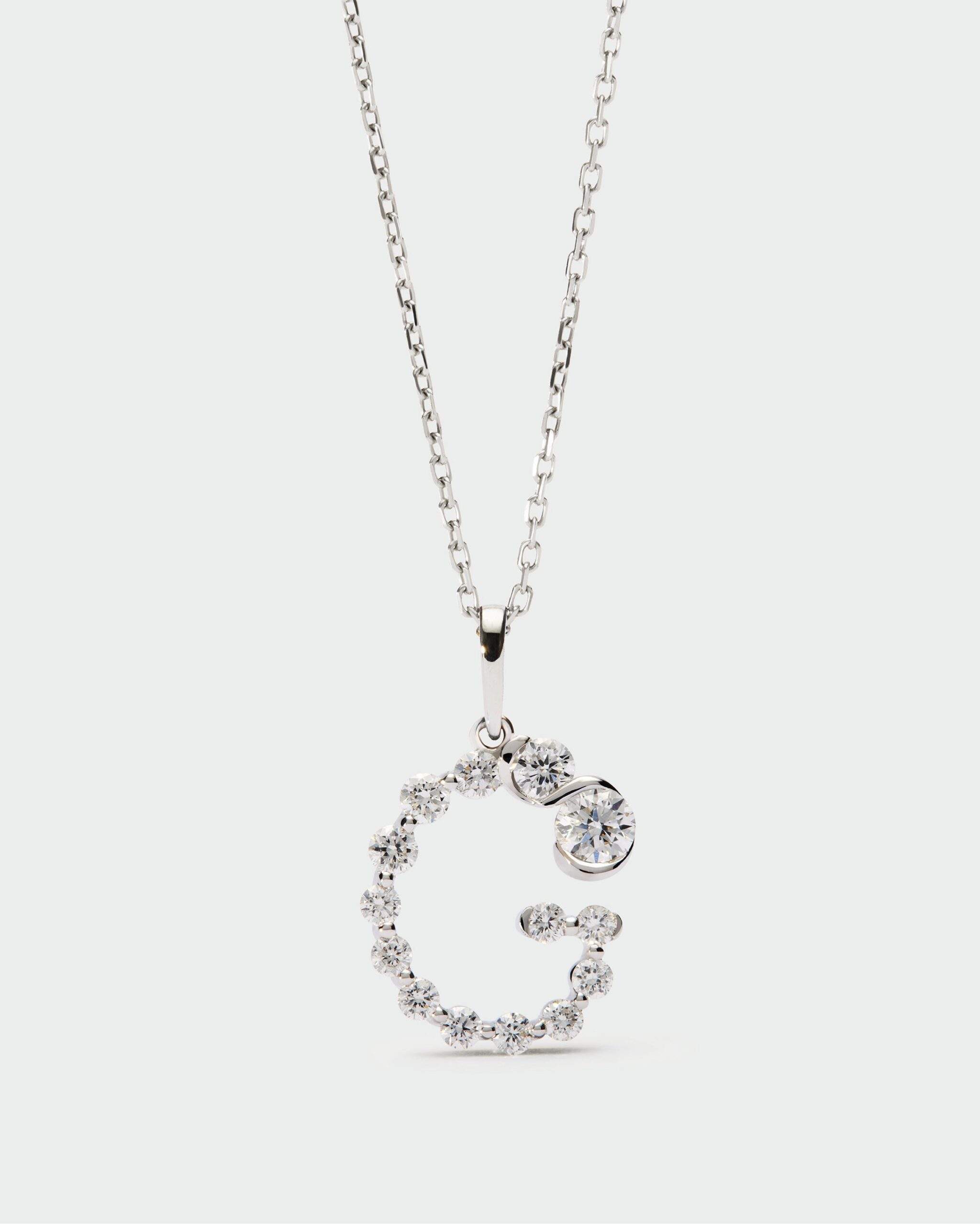 Diamonds and white gold Initial pendant