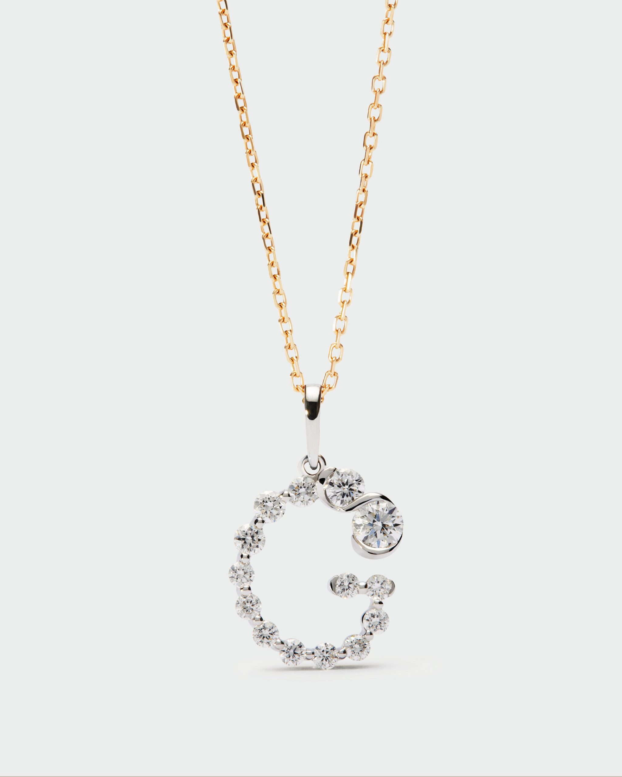 Diamonds and white gold Initial pendant