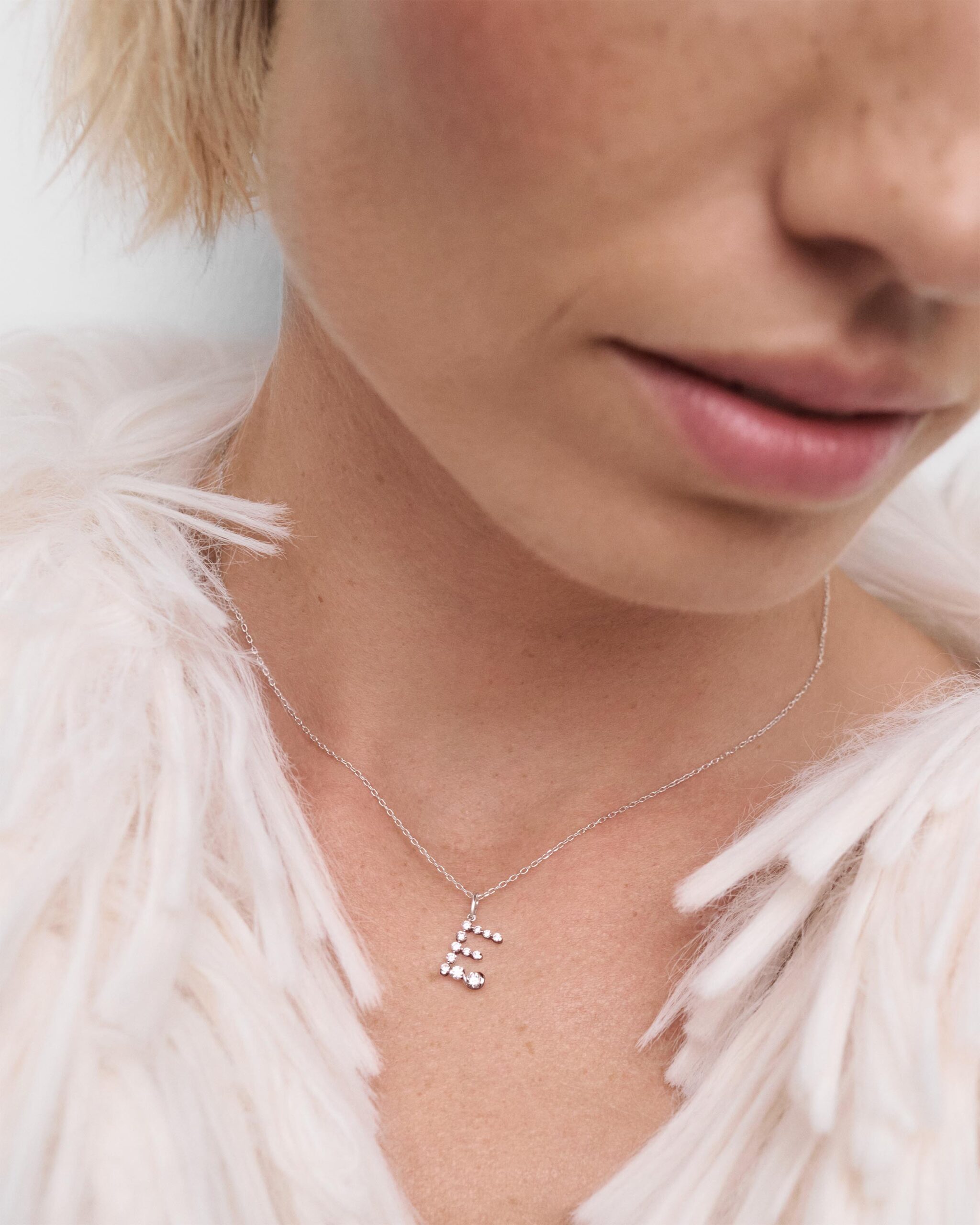 Diamonds and white gold Initial pendant