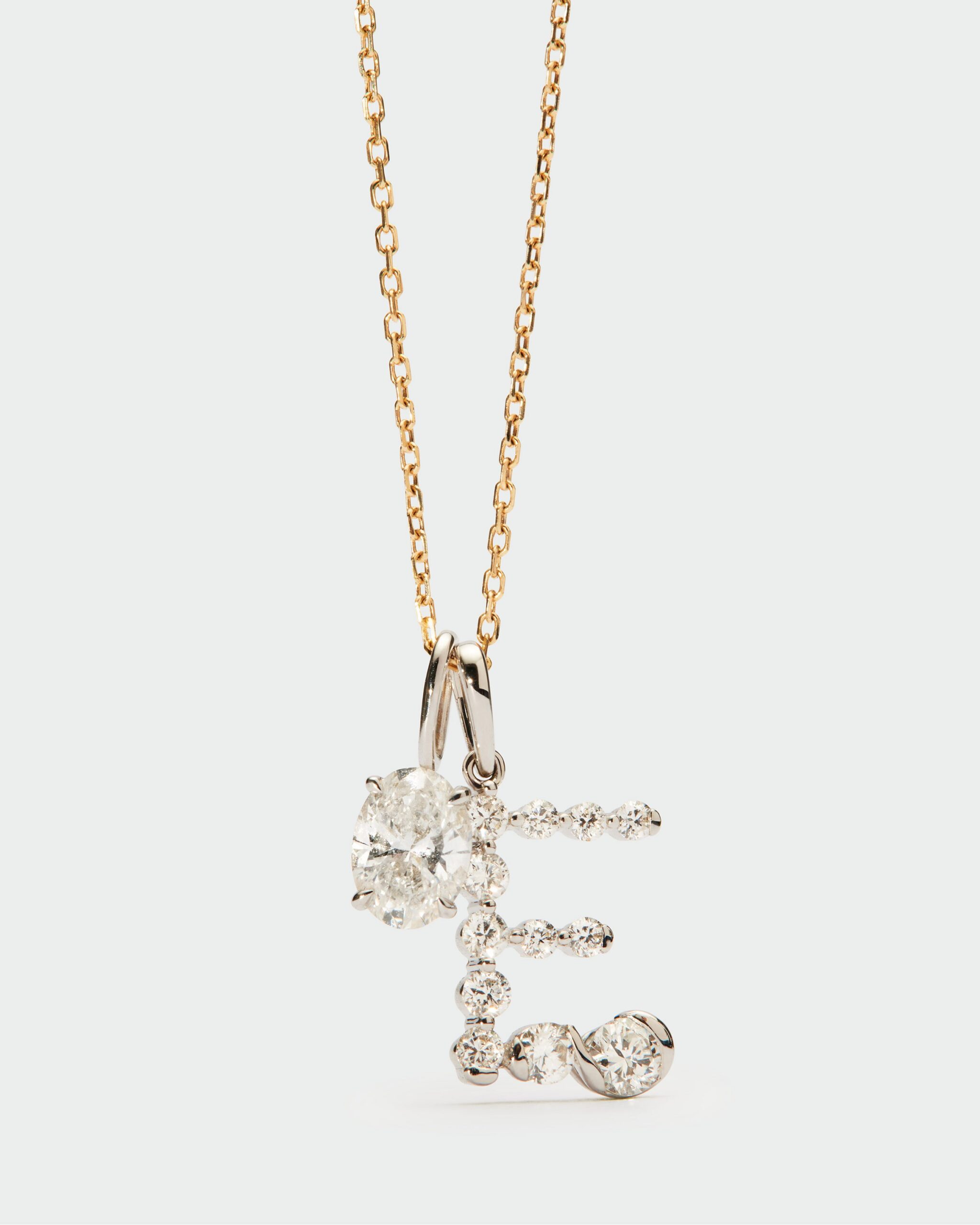 Diamonds and white gold Initial pendant