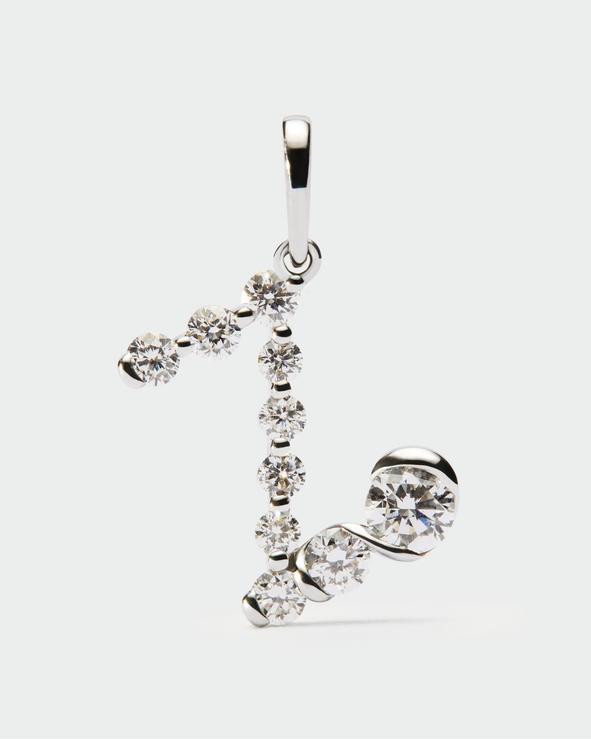 Diamonds and white gold Initial pendant