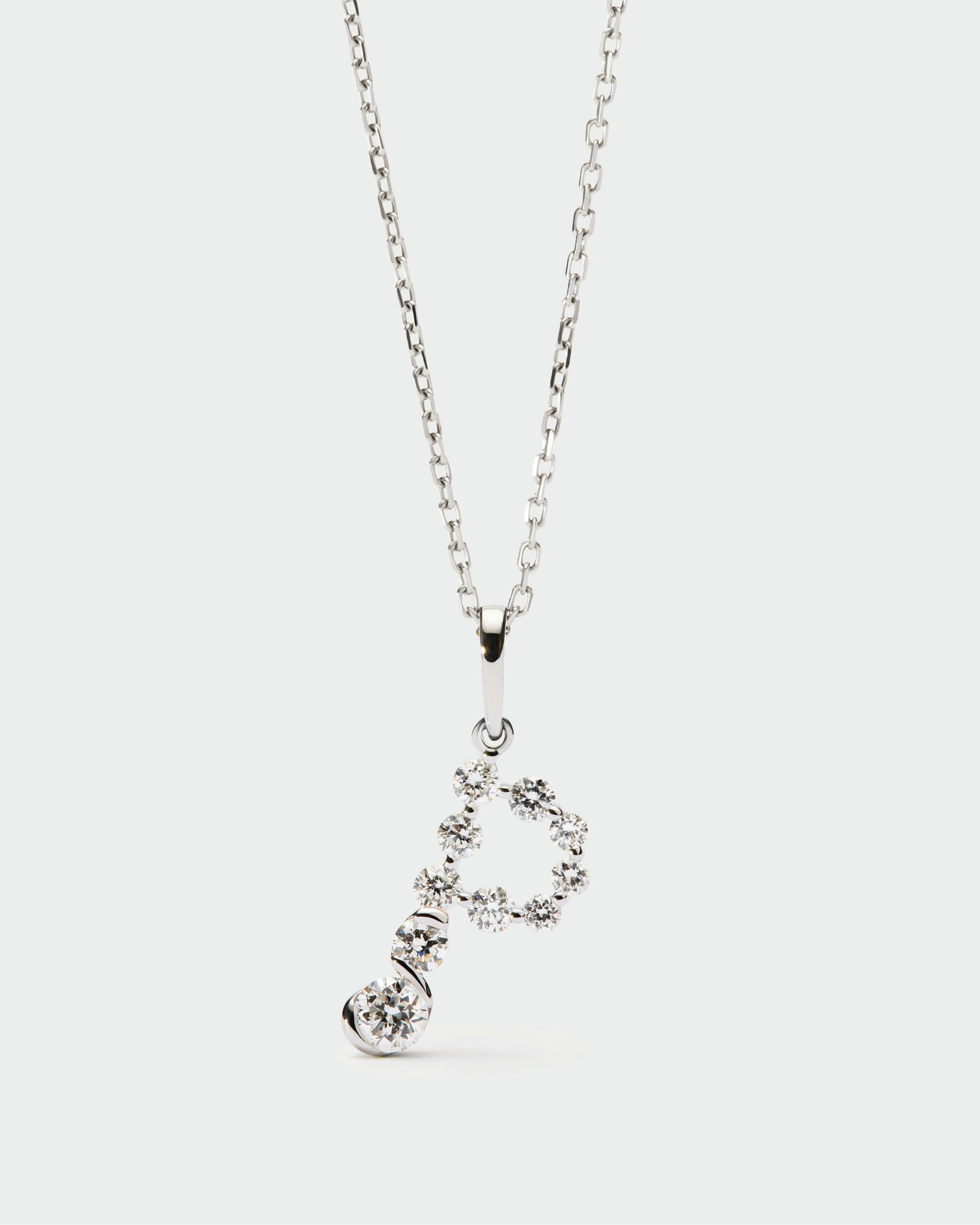 Diamonds and white gold Initial pendant