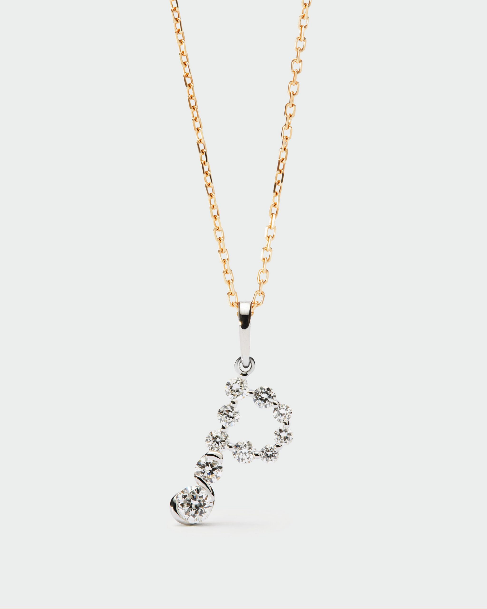 Diamonds and white gold Initial pendant