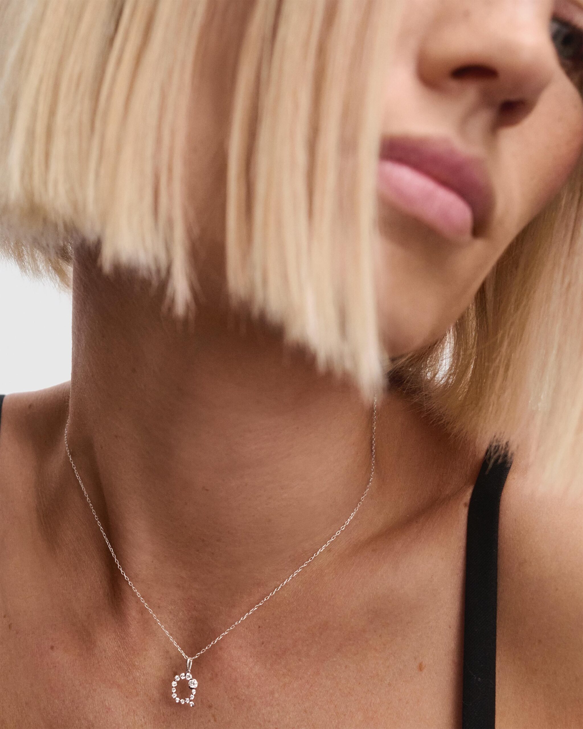 Diamonds and white gold Initial pendant