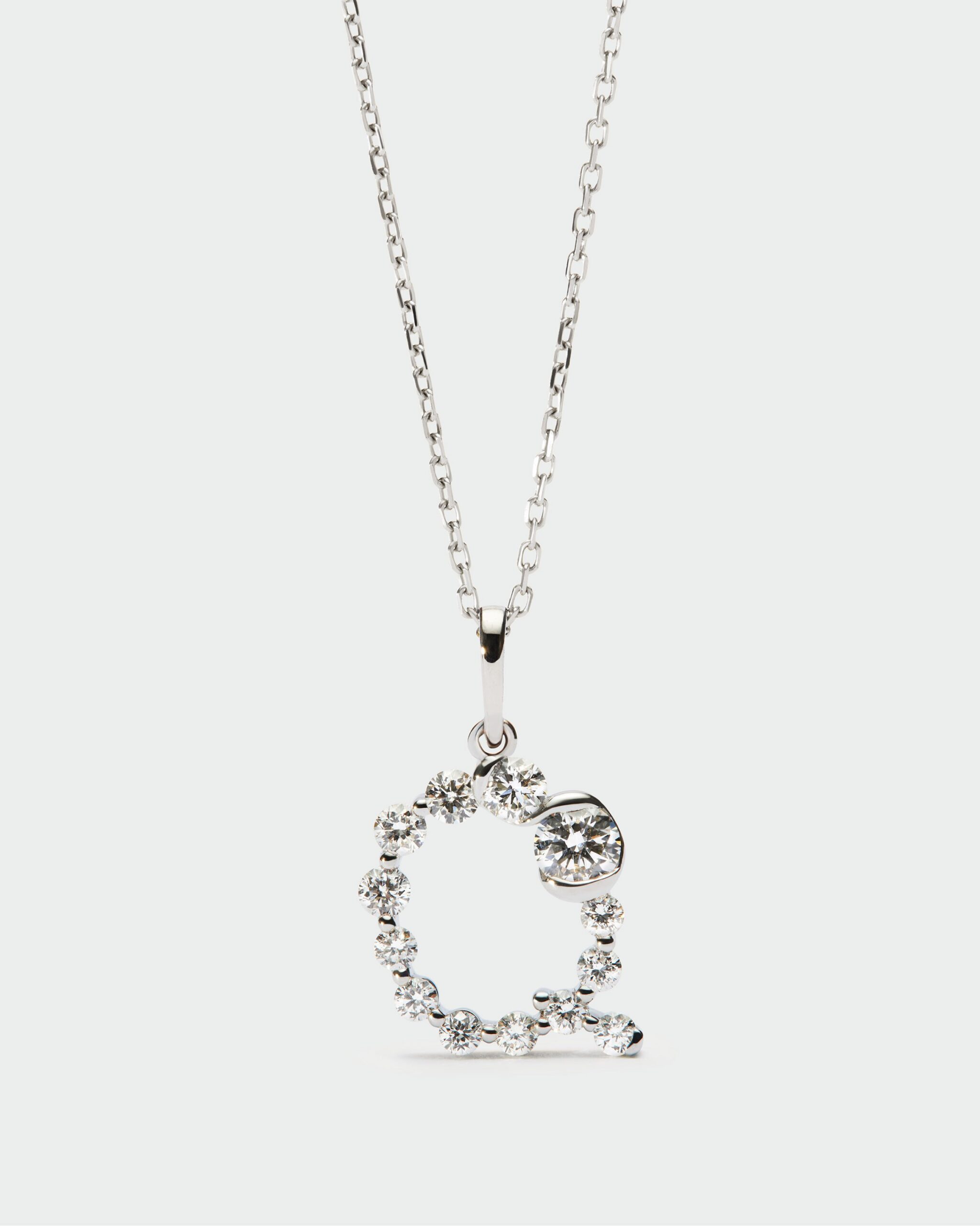 Diamonds and white gold Initial pendant