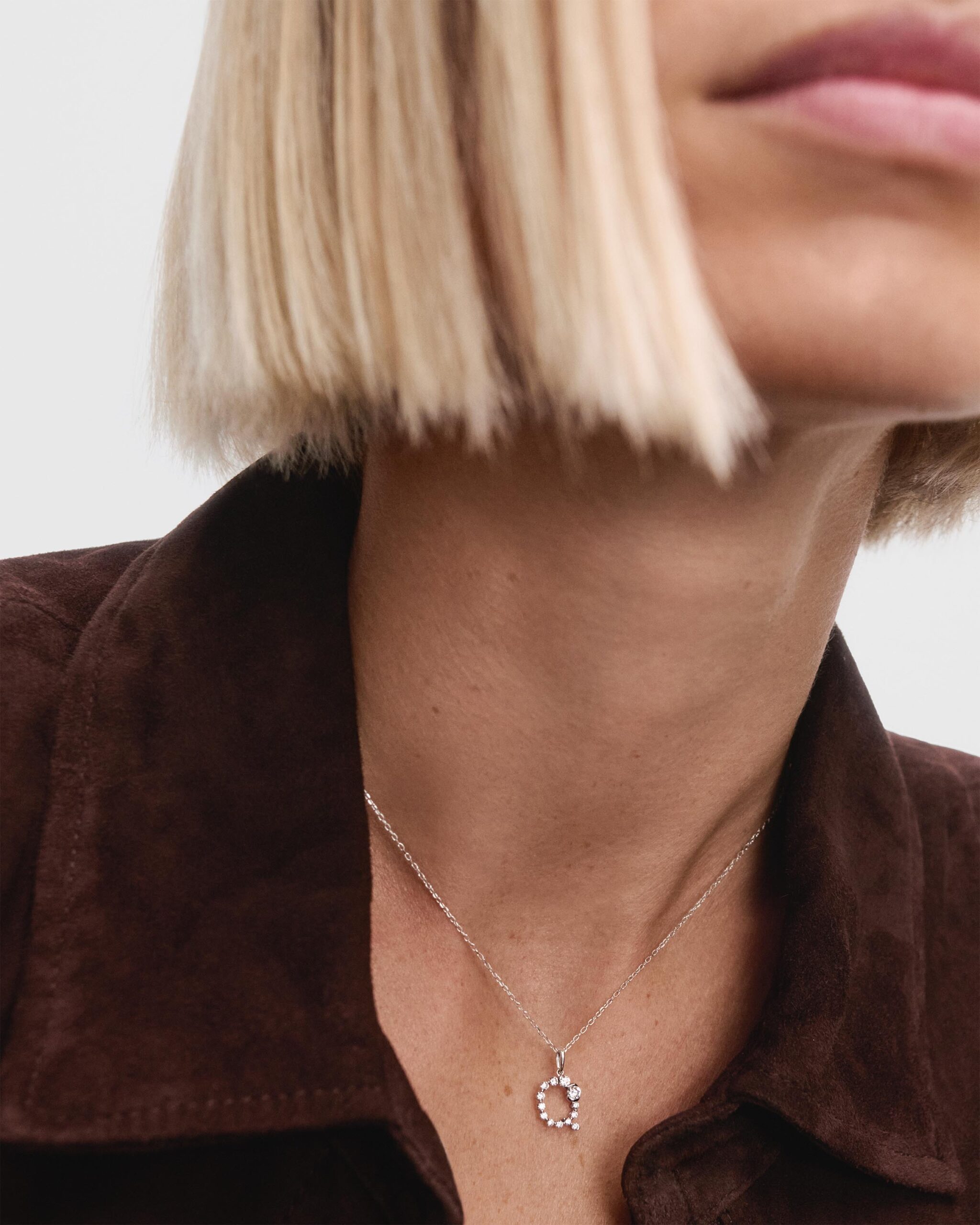 Diamonds and white gold Initial pendant