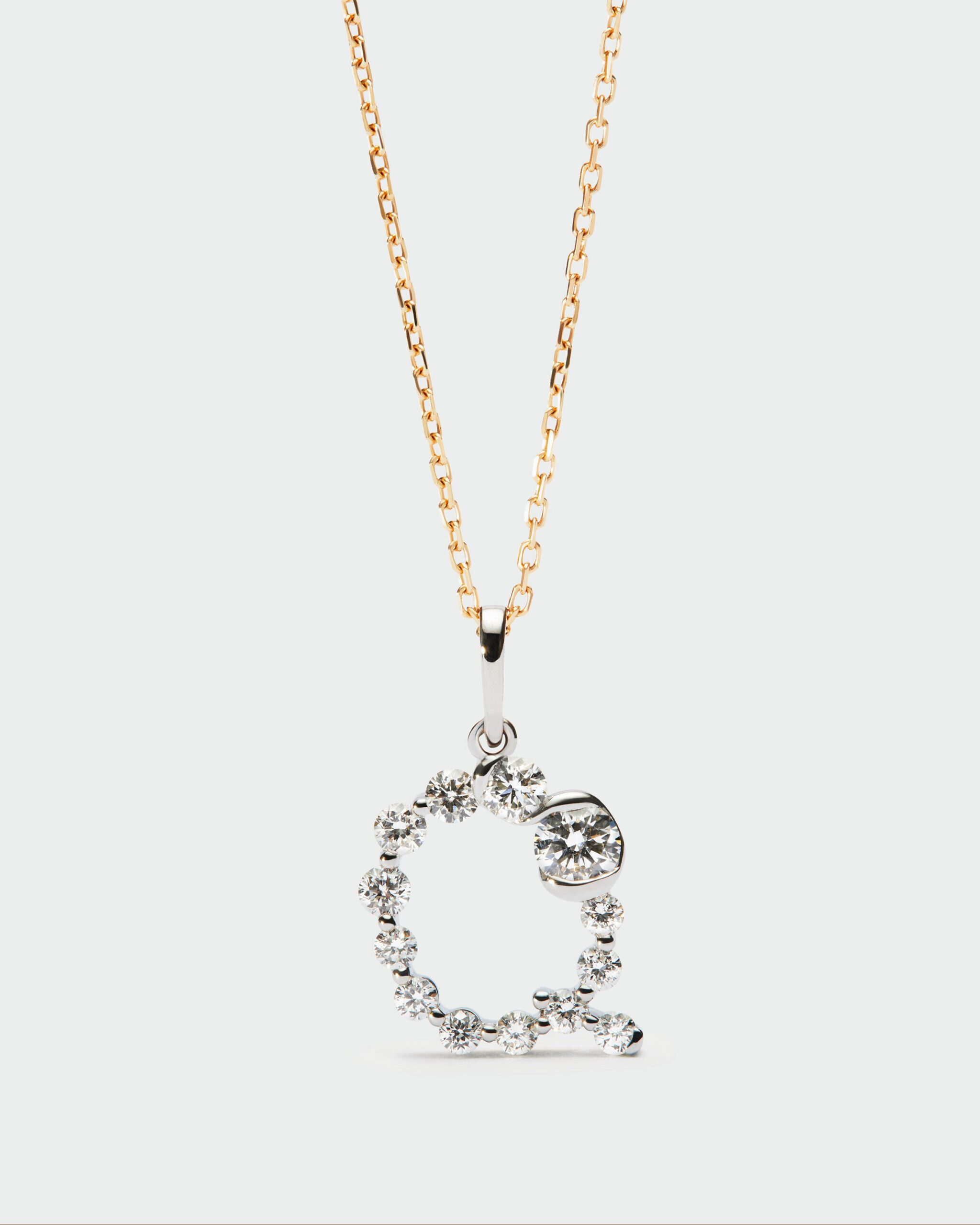 Diamonds and white gold Initial pendant