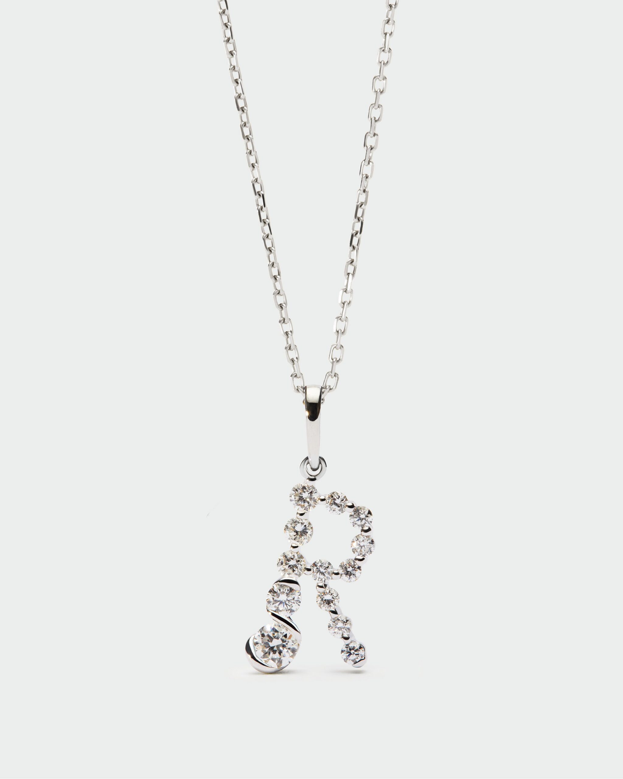 Diamonds and white gold Initial pendant
