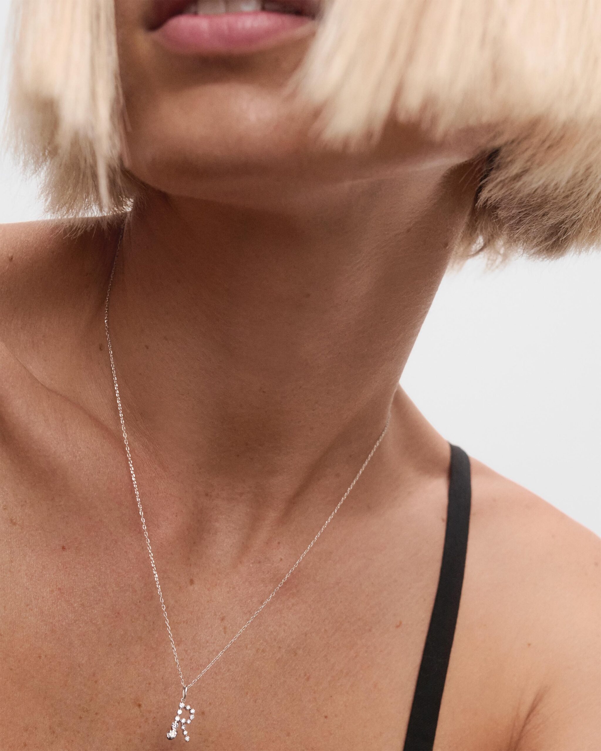 Diamonds and white gold Initial pendant