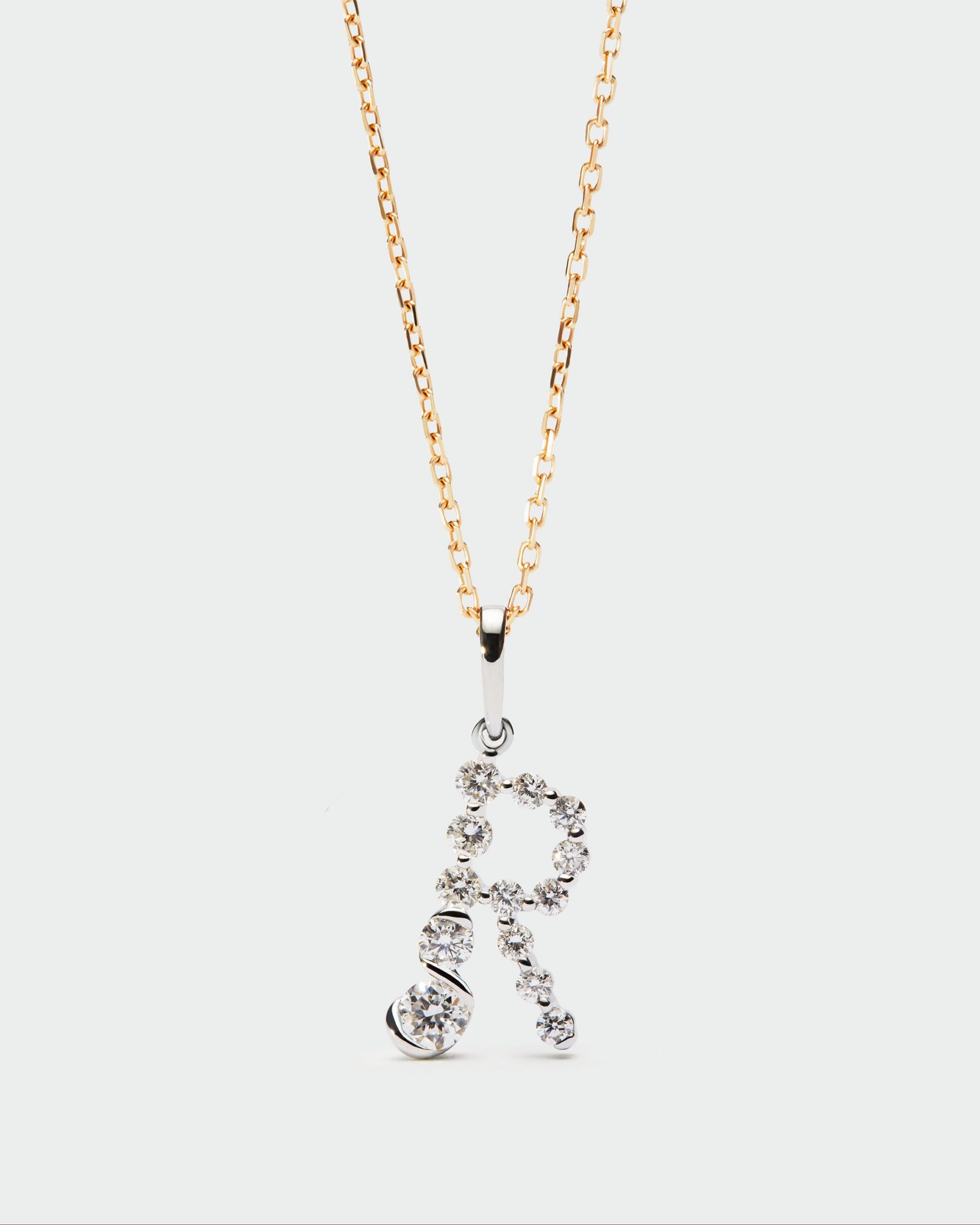 Diamonds and white gold Initial pendant