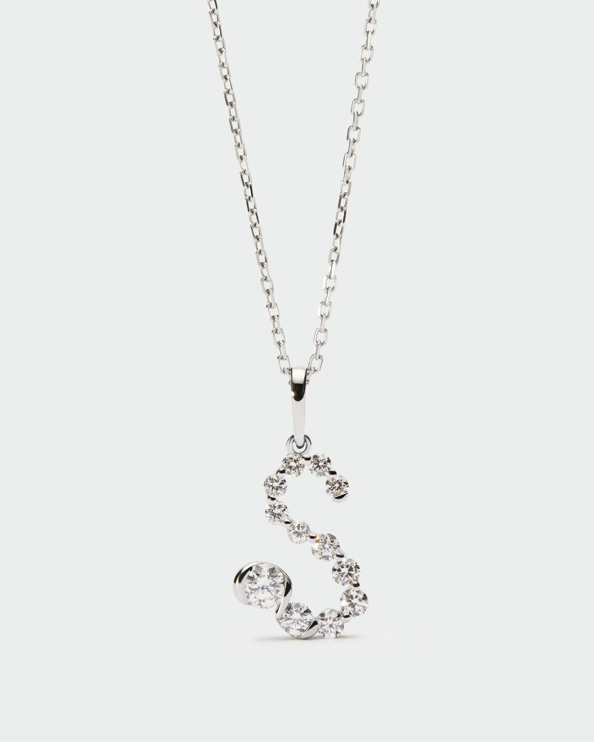 Diamonds and white gold Initial pendant