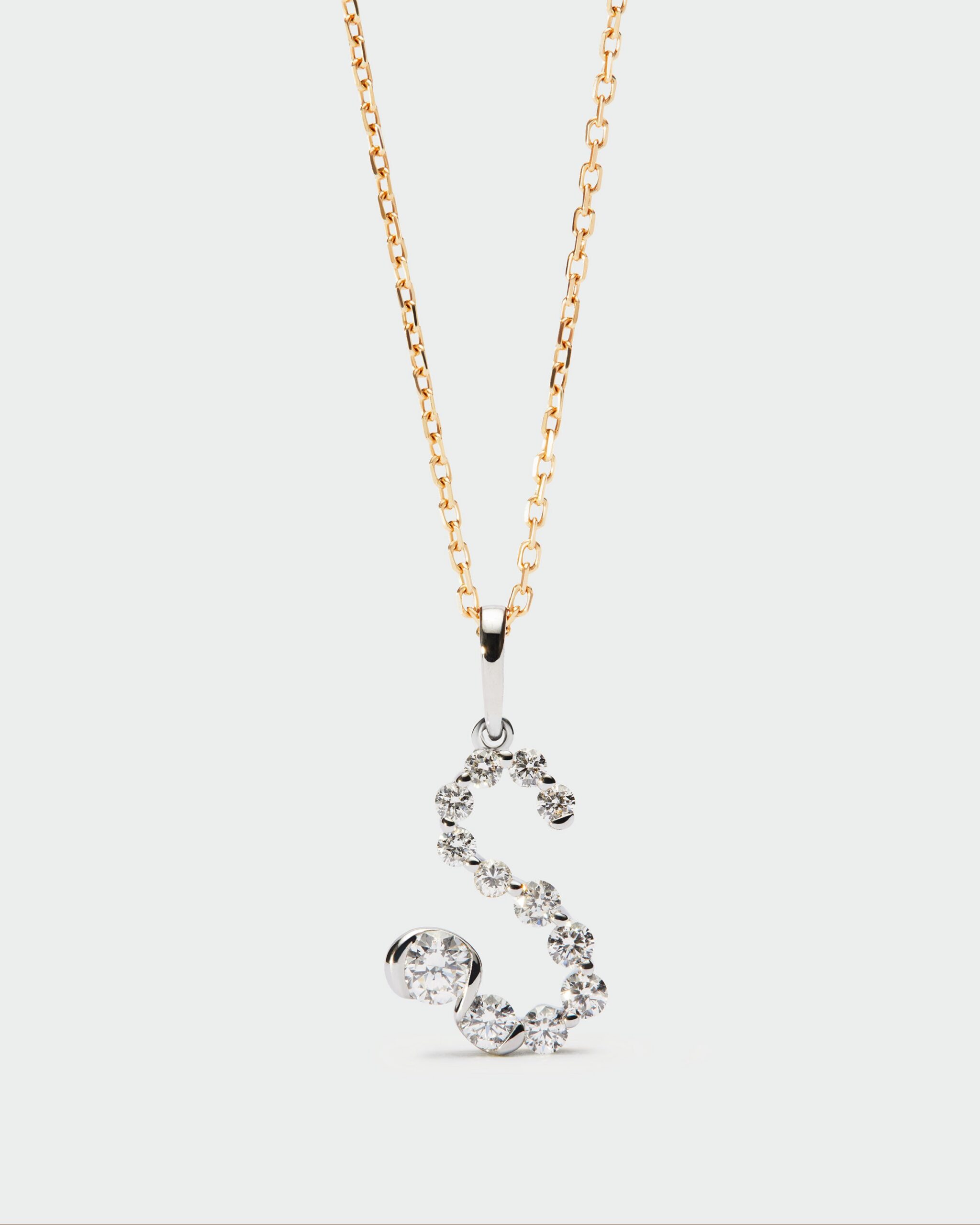 Diamonds and white gold Initial pendant