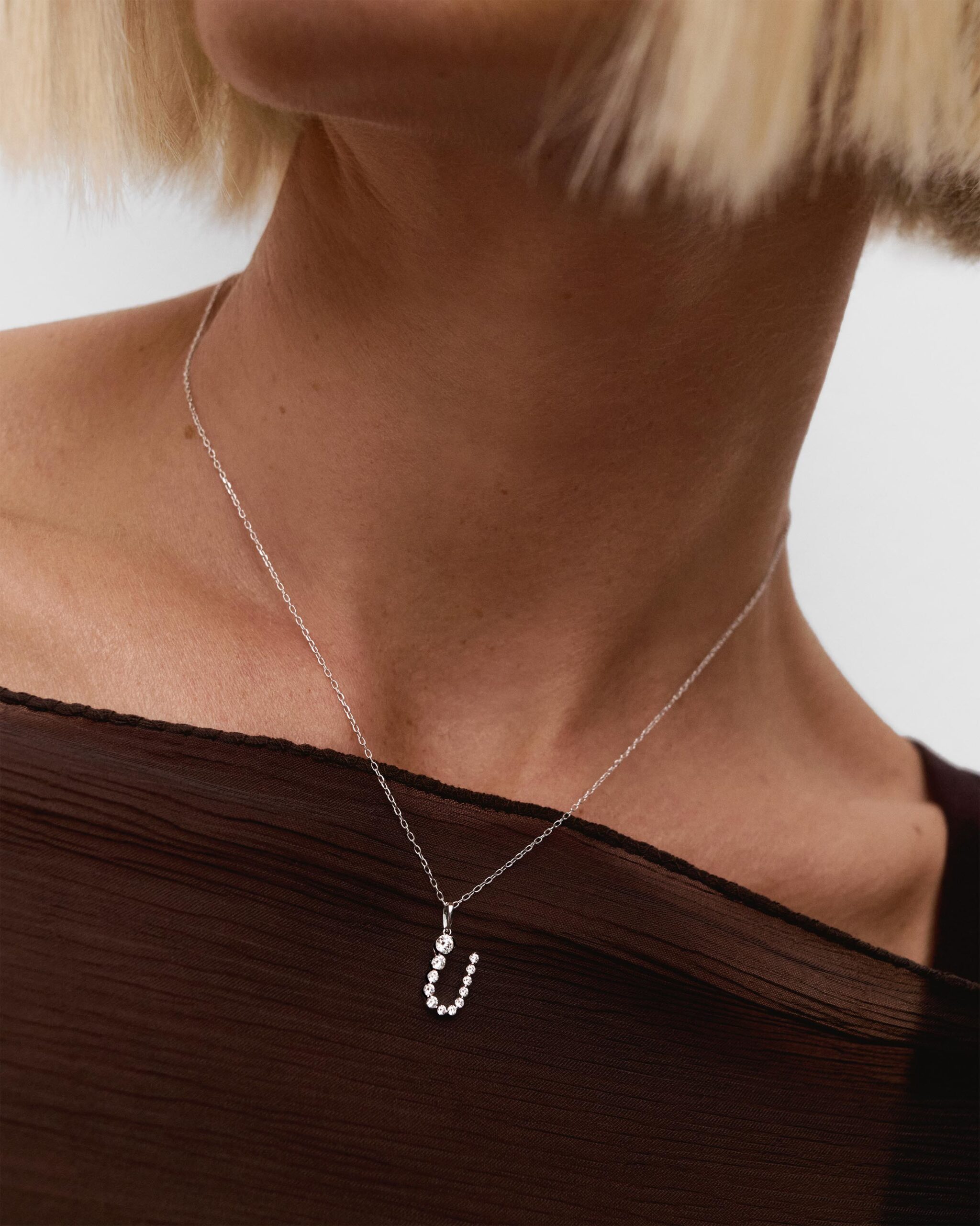 Diamonds and white gold Initial pendant