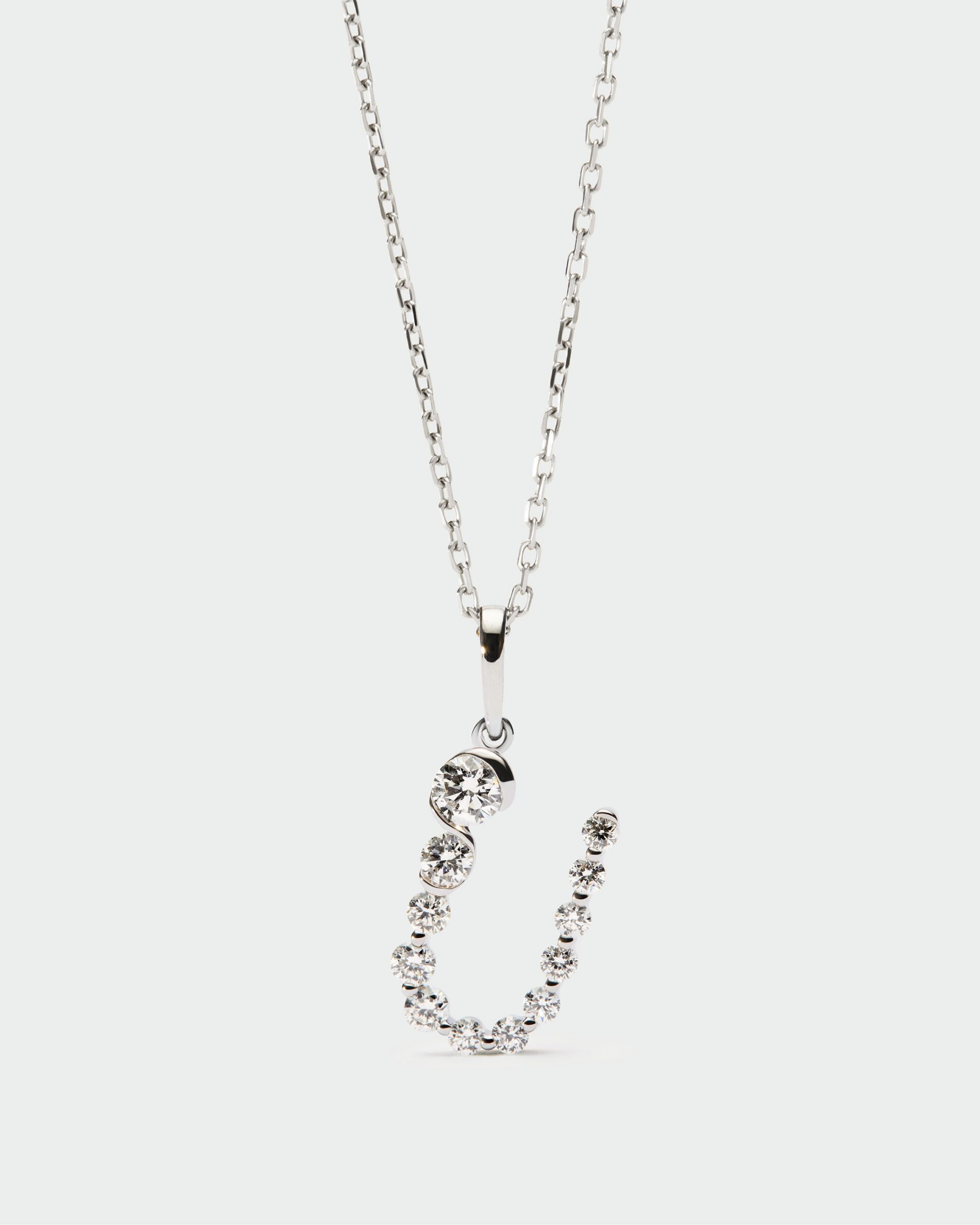 Diamonds and white gold Initial pendant