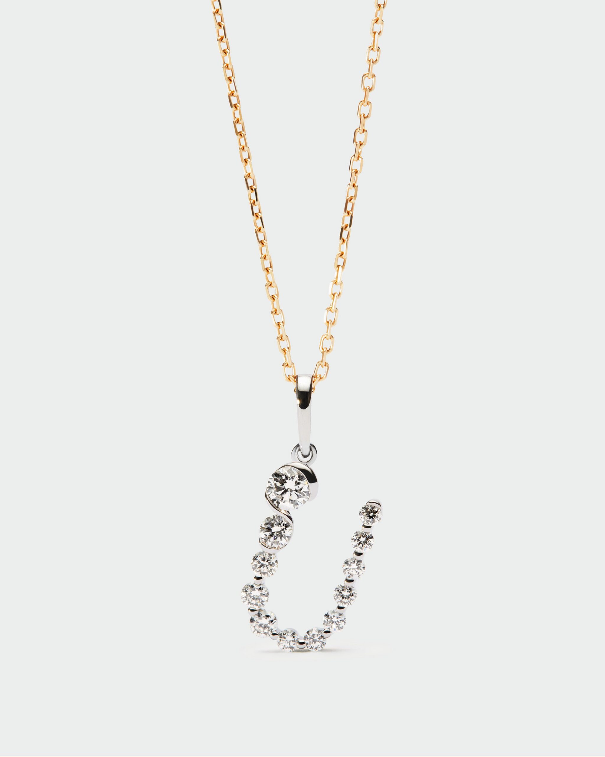 Diamonds and white gold Initial pendant