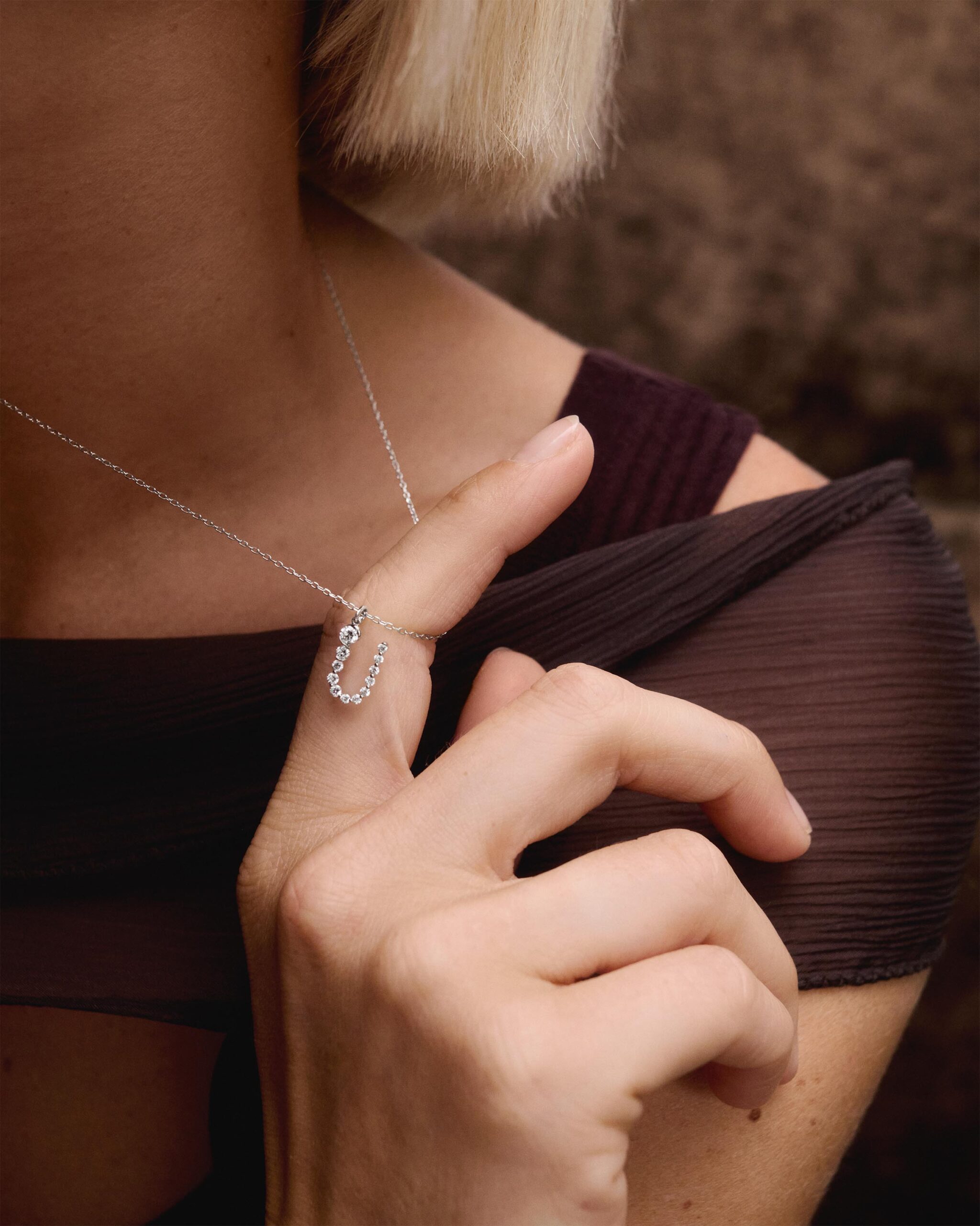 Diamonds and white gold Initial pendant