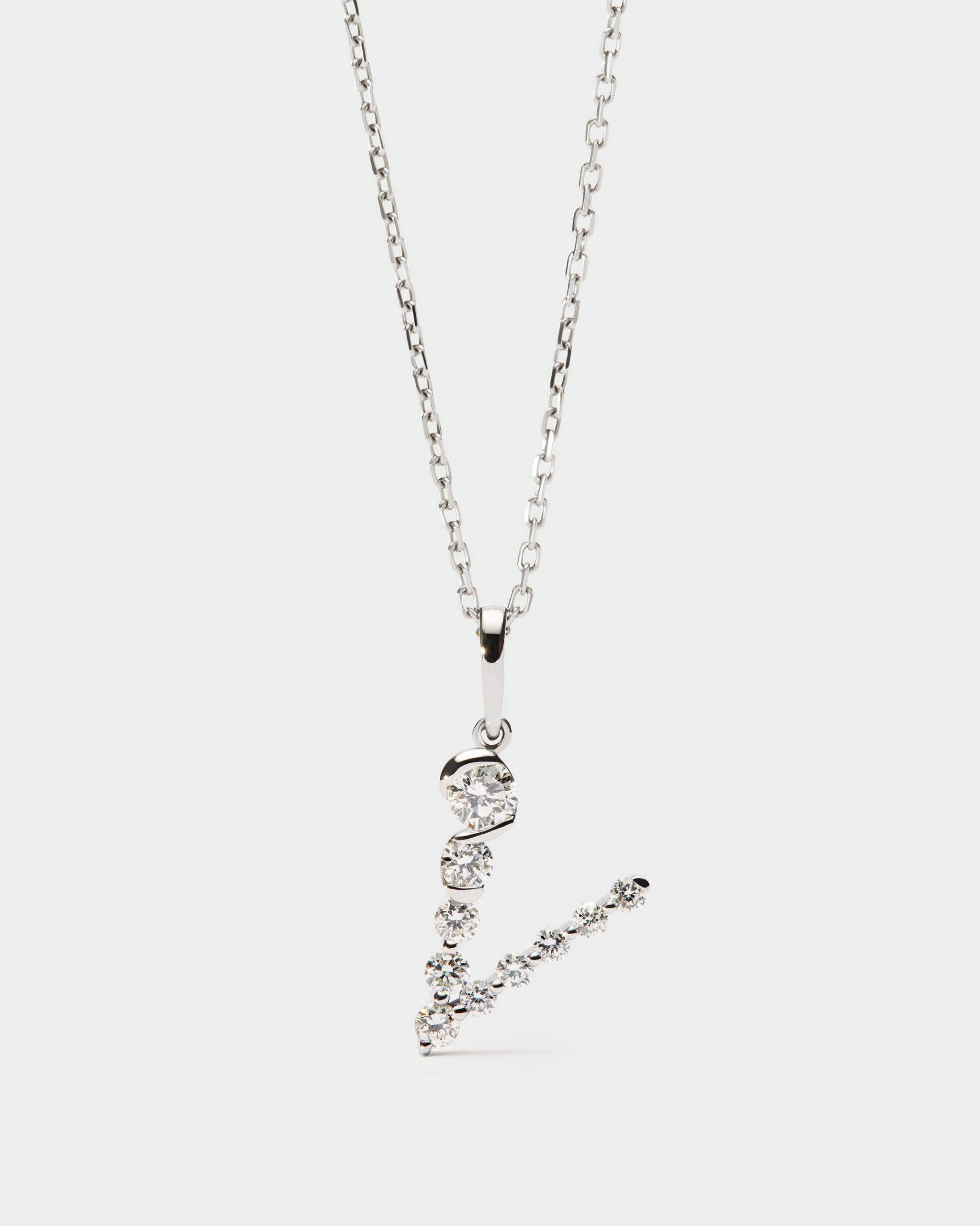 Diamonds and white gold Initial pendant