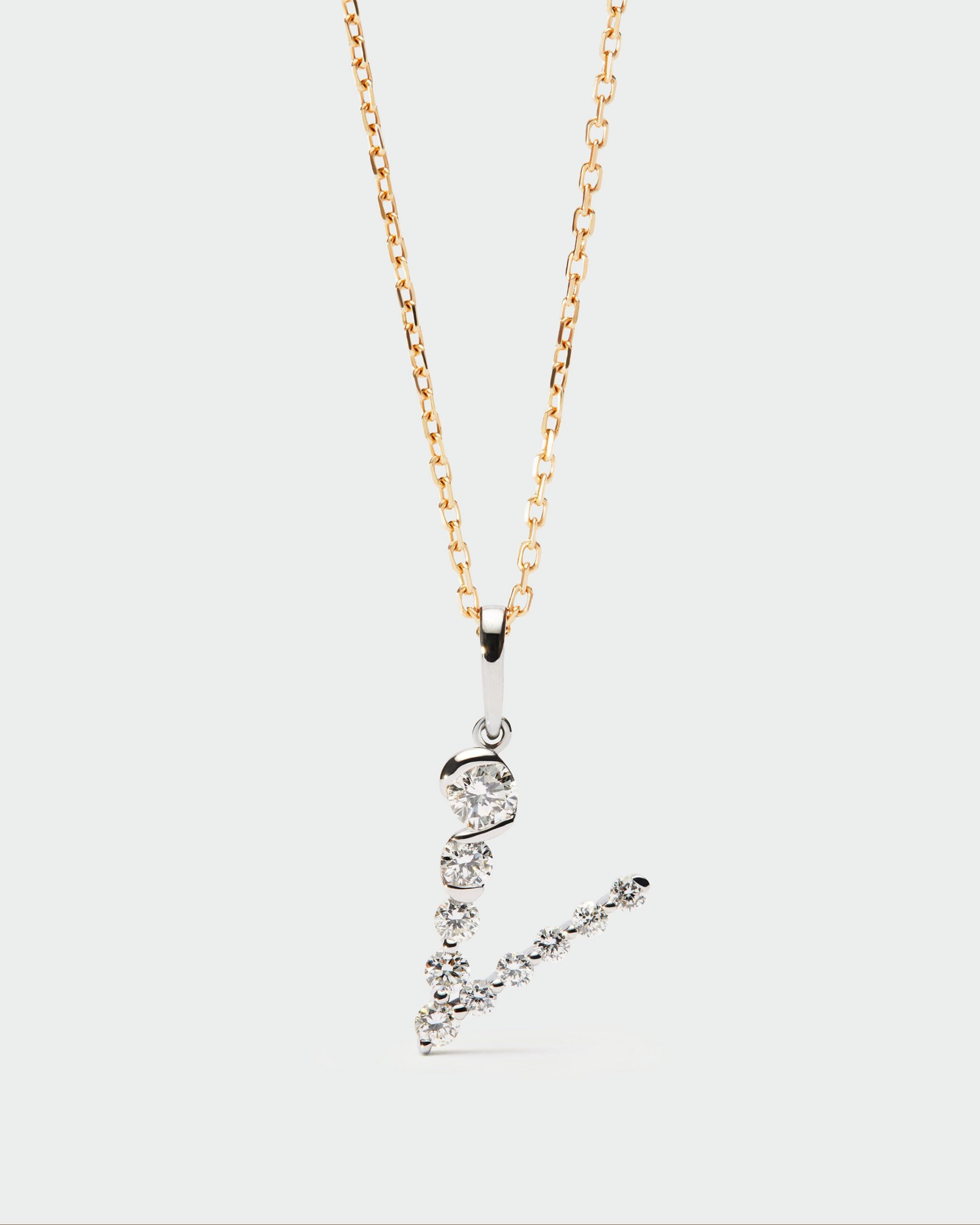 Diamonds and white gold Initial pendant