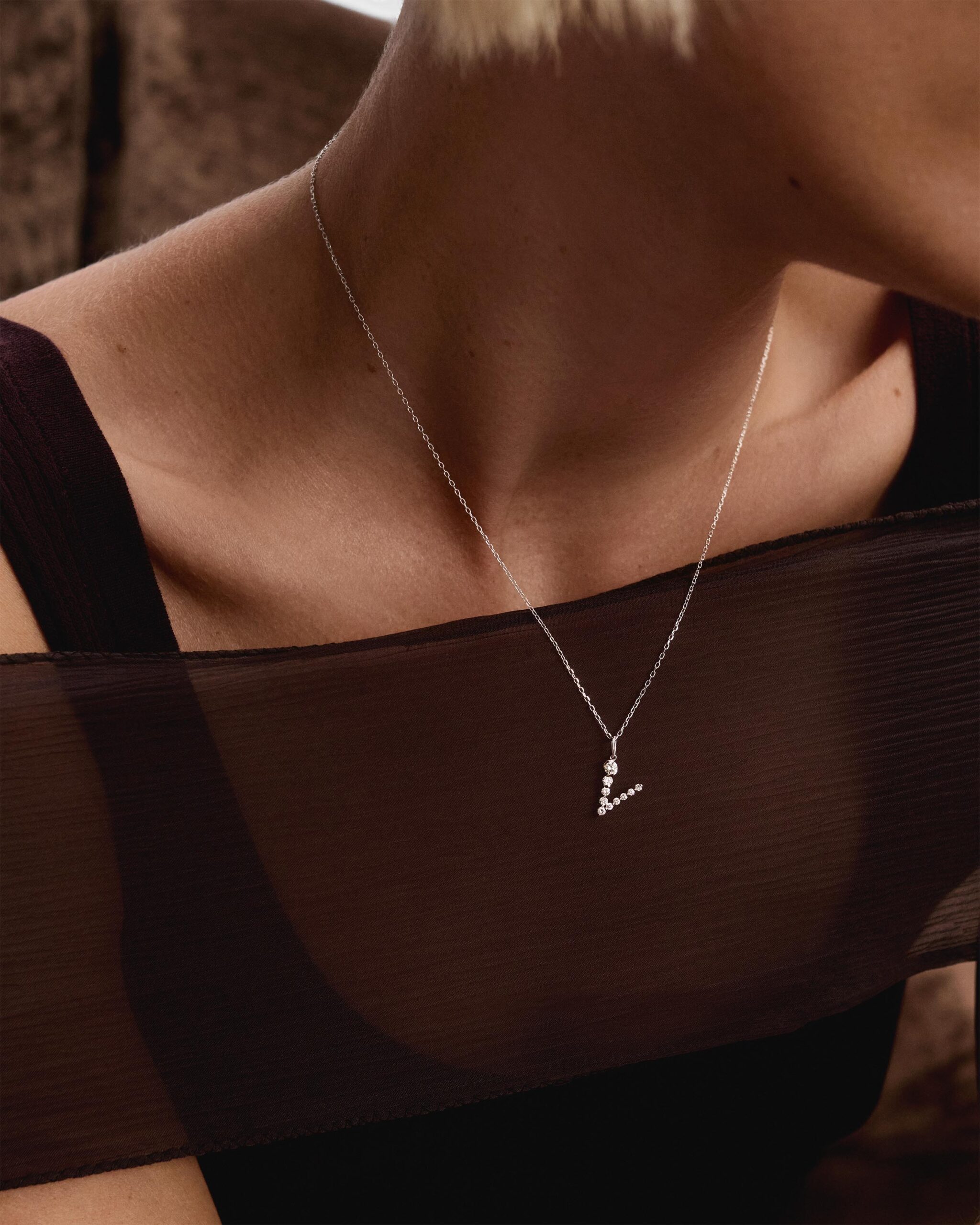 Diamonds and white gold Initial pendant