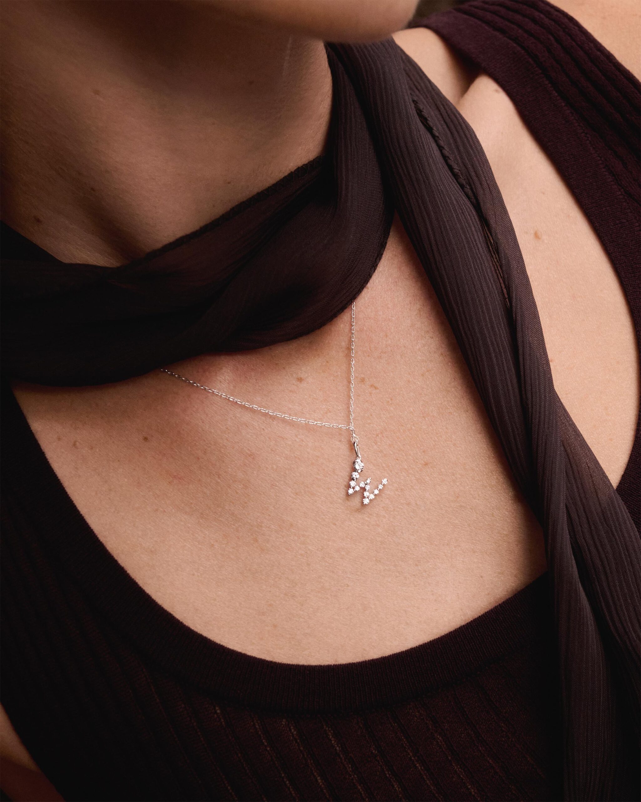 Diamonds and white gold Initial pendant