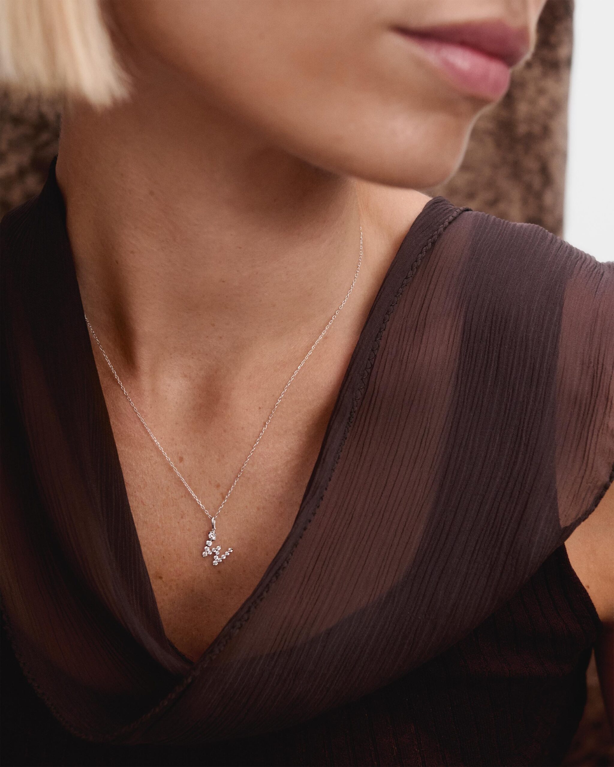 Diamonds and white gold Initial pendant