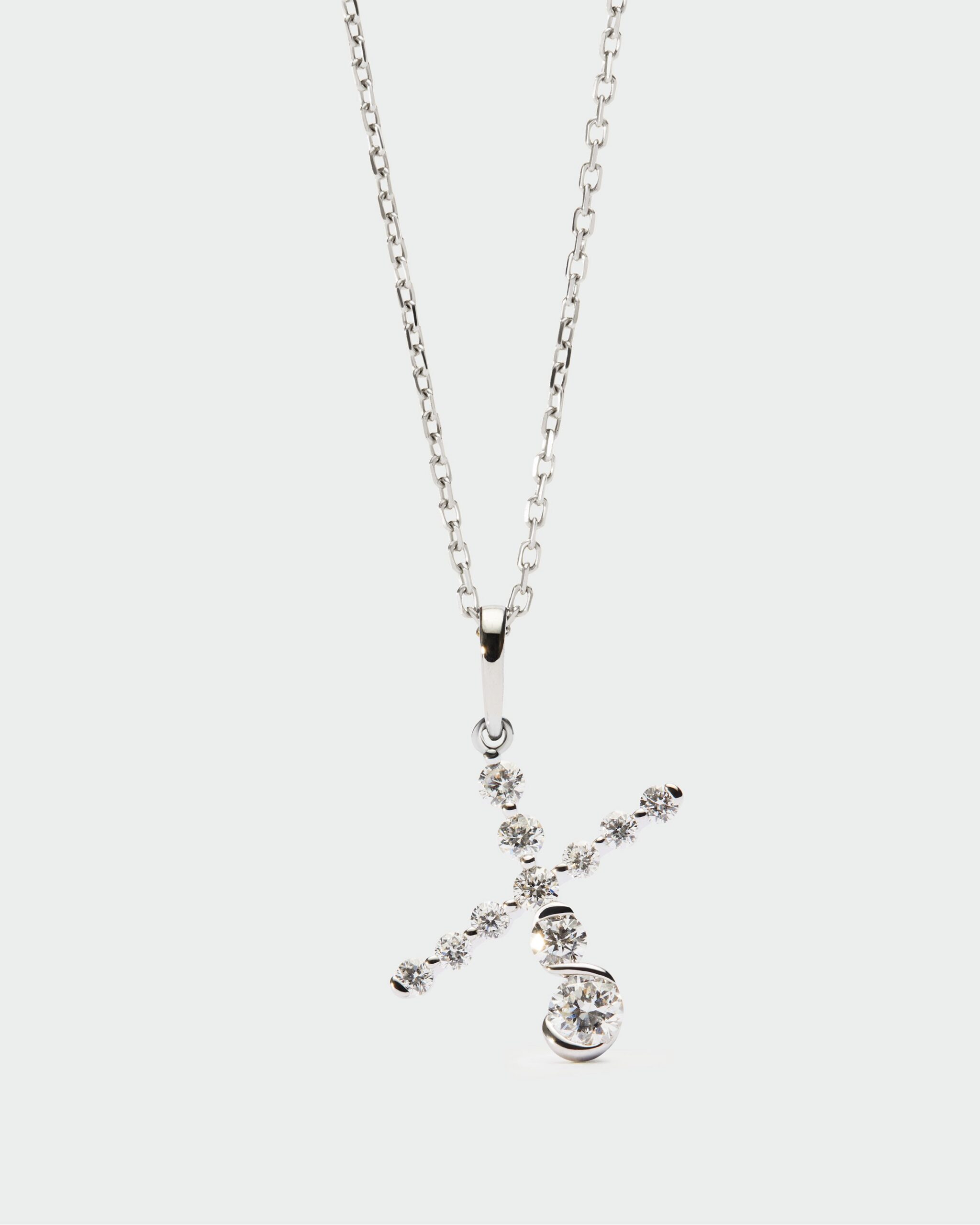 Diamonds and white gold Initial pendant