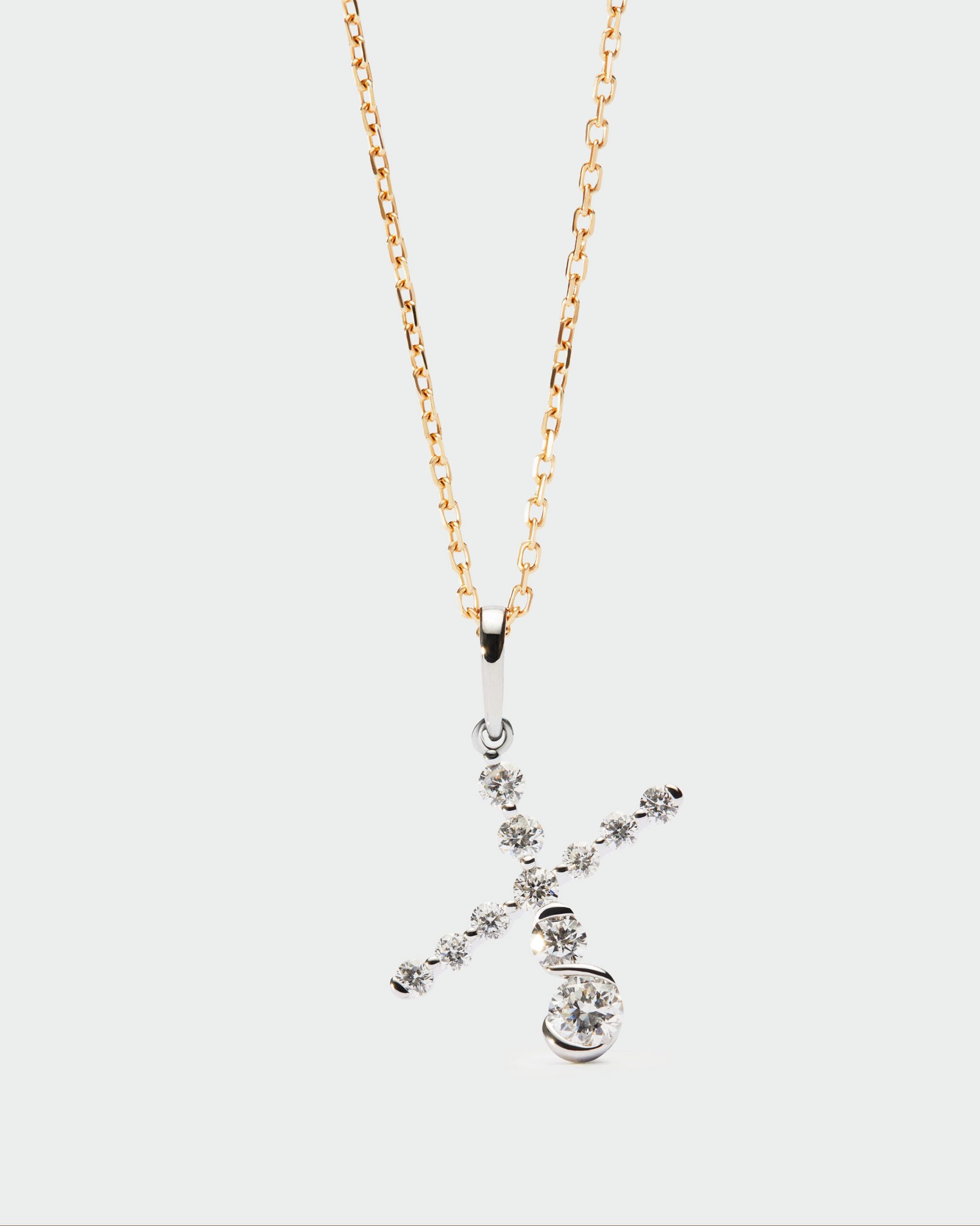 Diamonds and white gold Initial pendant