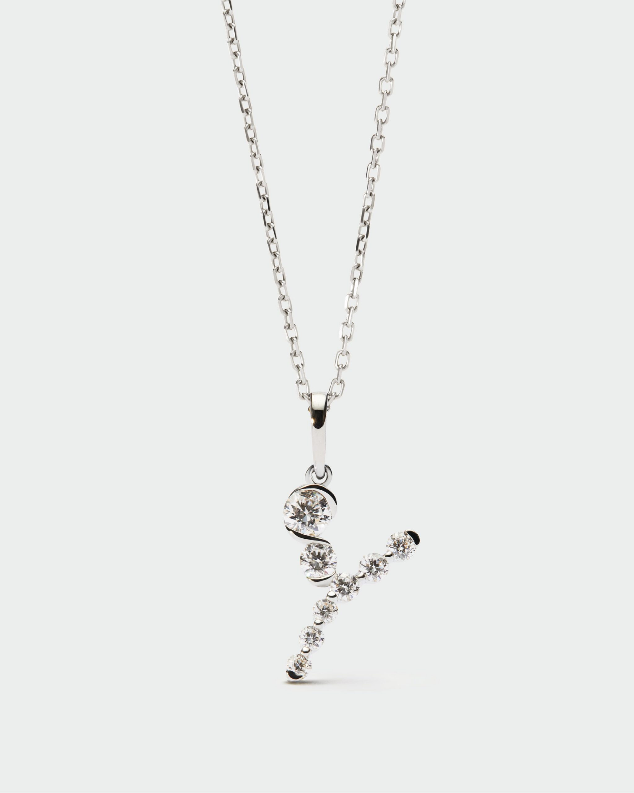 Diamonds and white gold Initial pendant