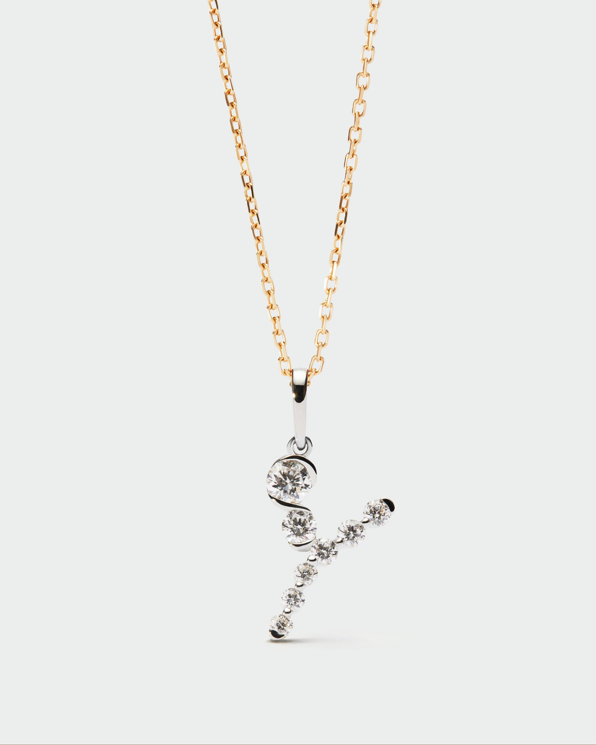 Diamonds and white gold Initial pendant
