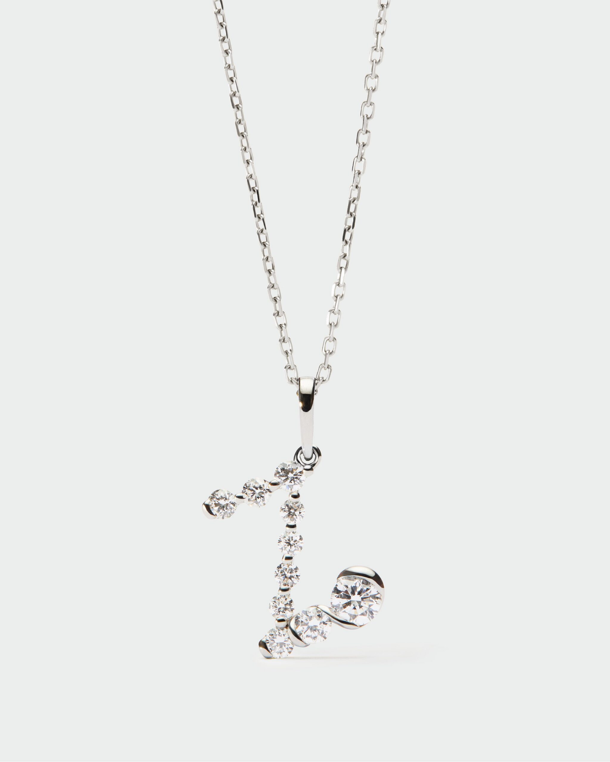 Diamonds and white gold Initial pendant