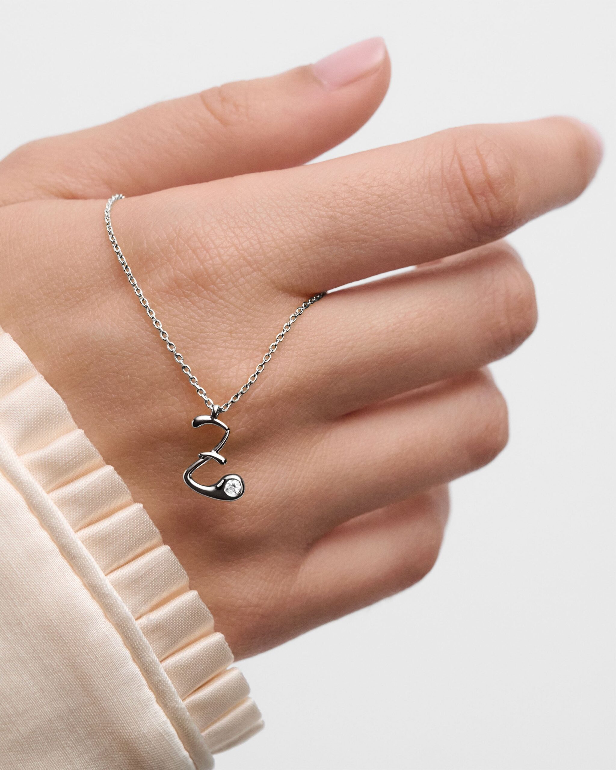 Initial silver pendant necklace