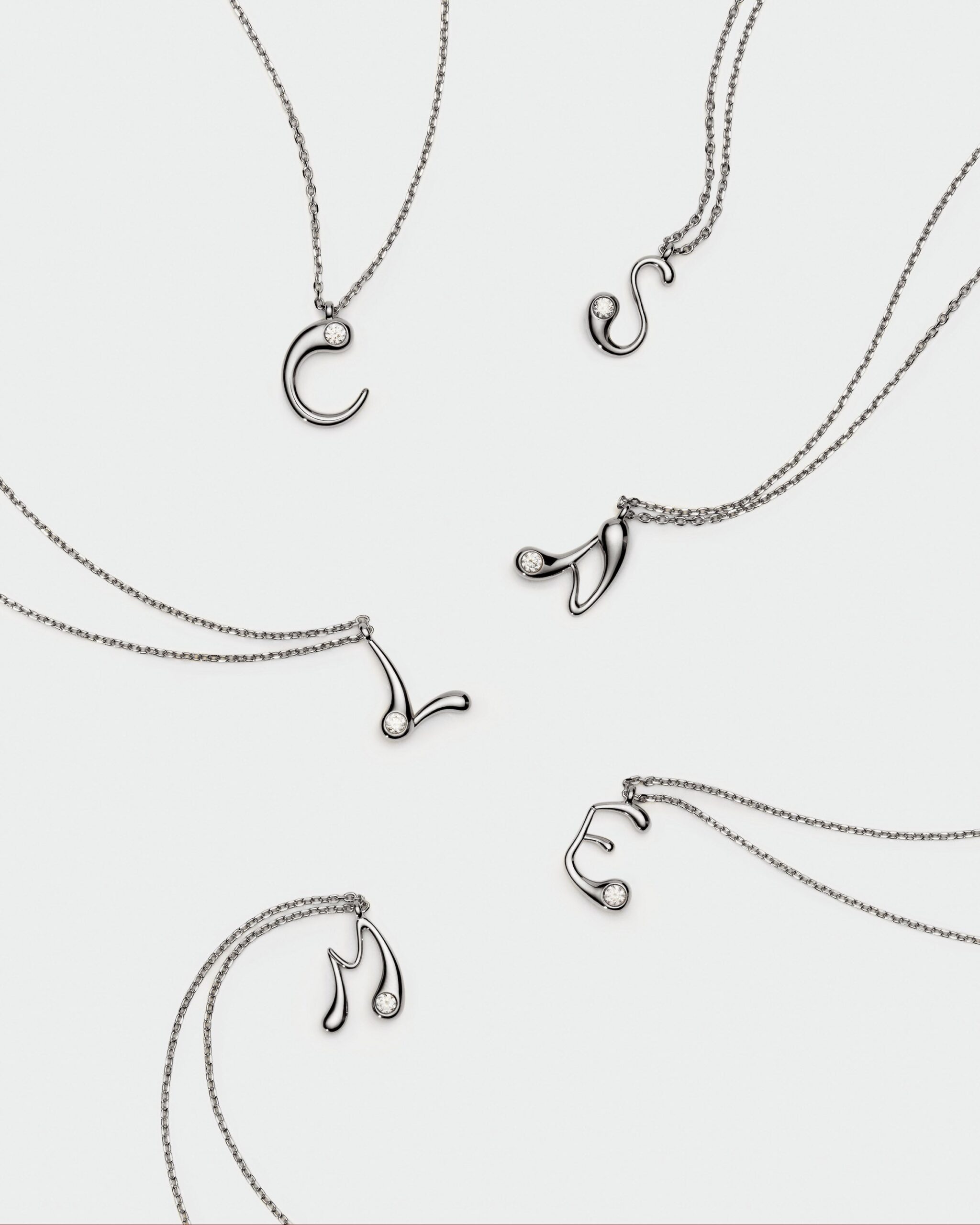 Initial silver pendant necklace